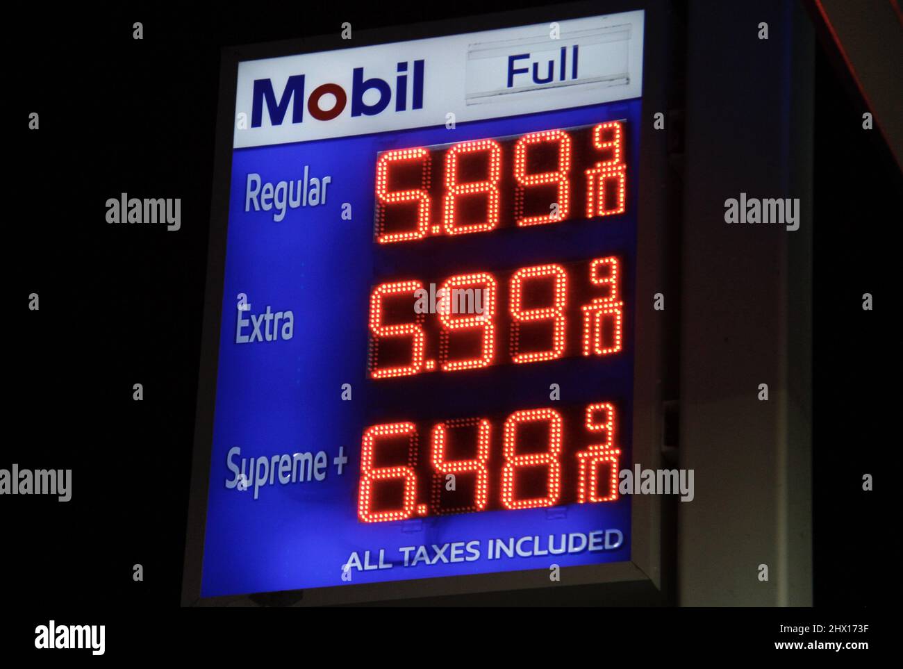March 8, 2022, %G: (NEW) Average price of regular Gas reaches $5.89 in New York. March 8, 2022, New York, USA: The average price for a gallon of regular gas in New York reaches $5.89 breaking the previous record of $4.11 in 2008. The continuous and faster increase of gas prices in USA and around the world is due to the Russian invasion of Ukraine. The US President Joe Biden has banned the importation of Russian oil on Tuesday (08) which will definitely cause more increment to the gas price. Some of the customers at this Mobil gas station in Manhattan complained of the high price of gas and one Stock Photo