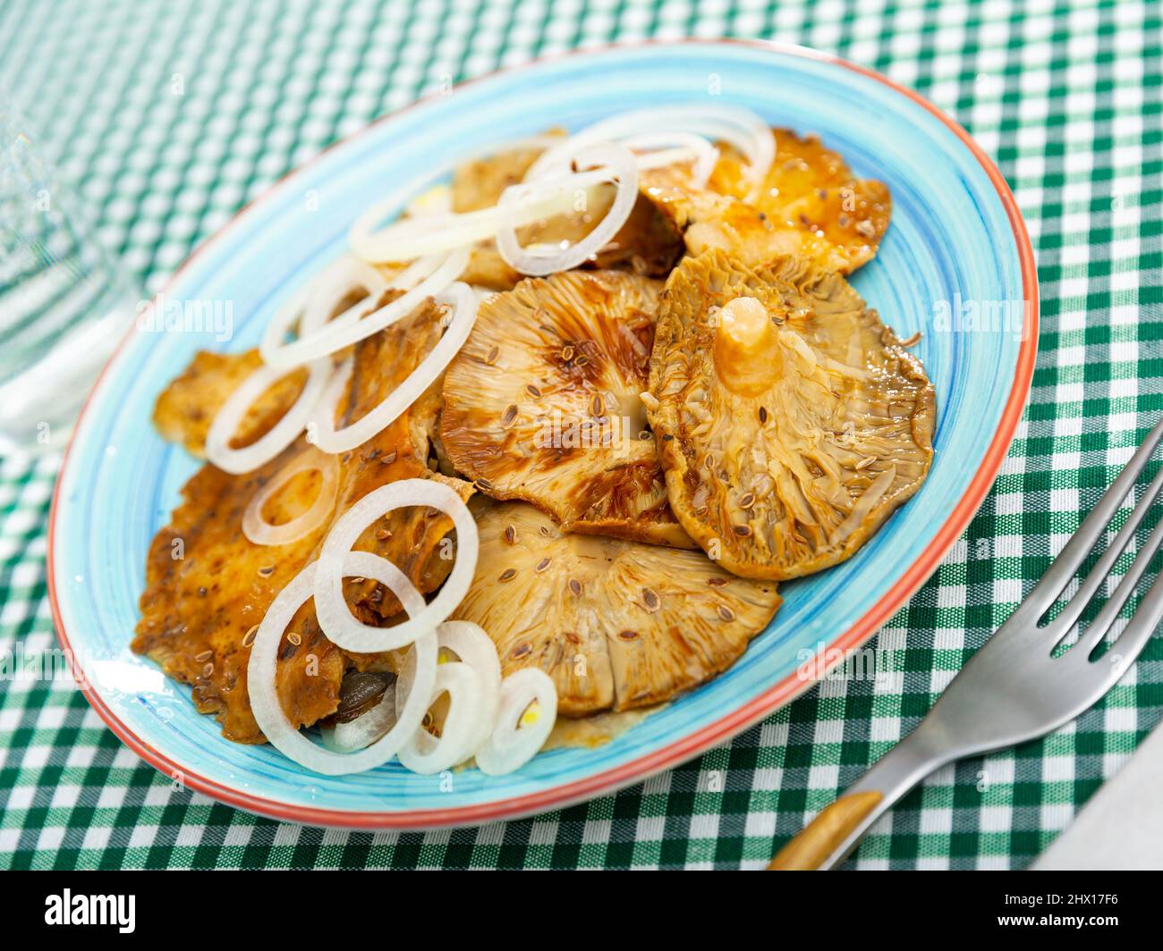 Homemade marinated white brittlegill mushrooms with onion Stock Photo