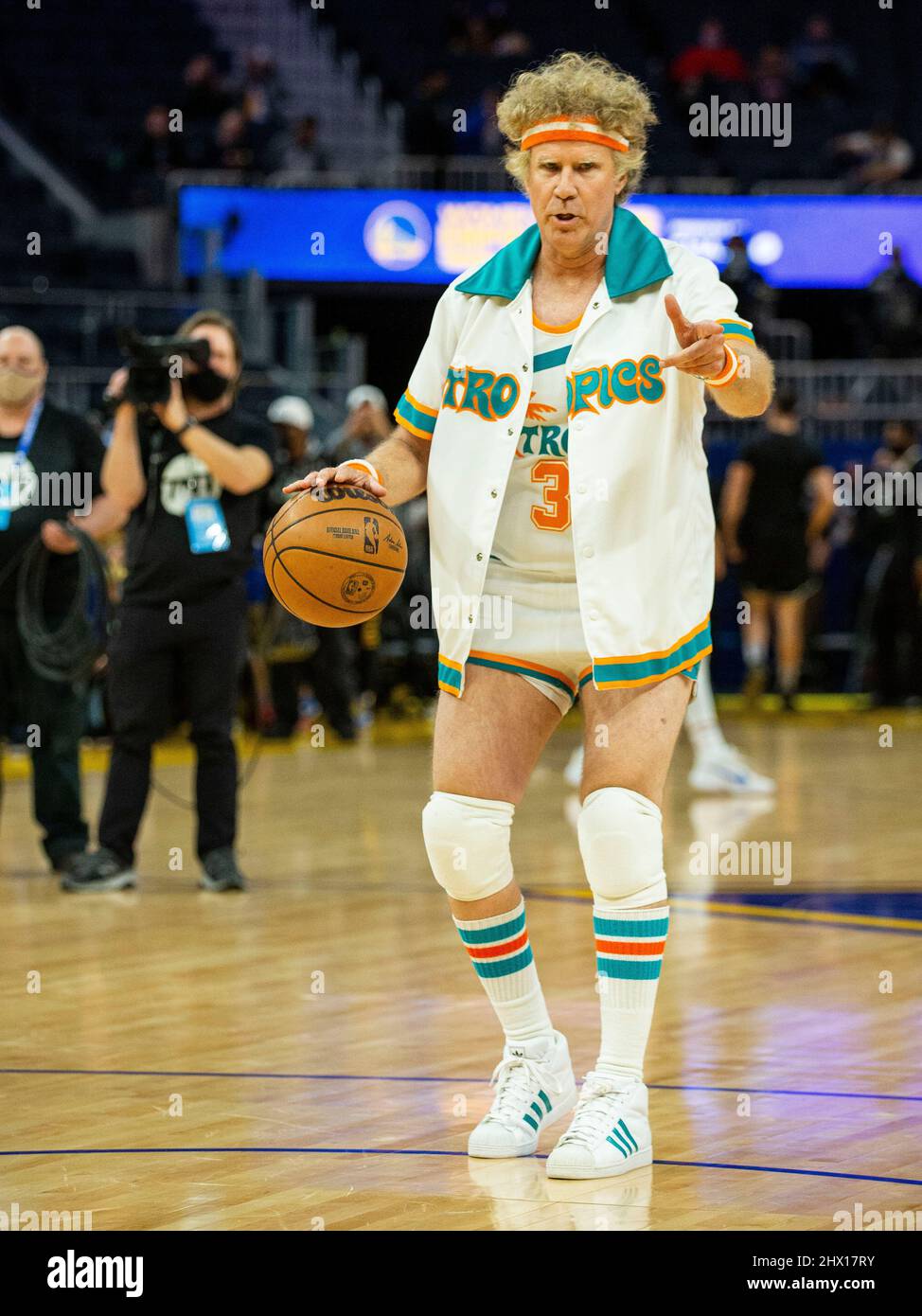 San Francisco, California. March 8, 2022, Actor Will Ferrell wears the Flint Tropics uniform from the feature film 'Semi-Pro' and joins the Golden State Warriors during warm-ups before the team plays against the Los Angeles Clippers at Chase Center on March 8, 2022 in San Francisco, California. Credit: CV/ImageSpace/MediaPunch Stock Photo