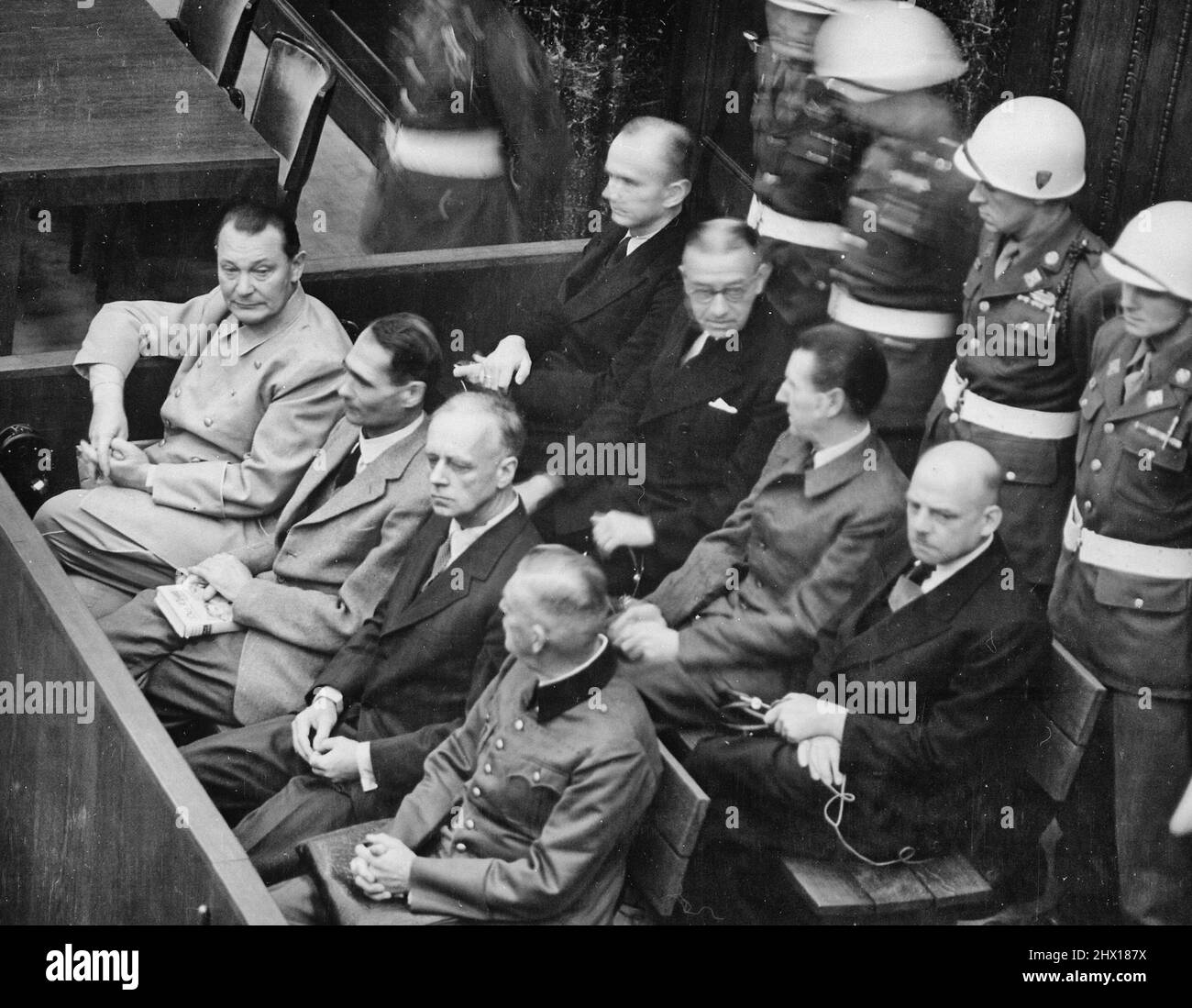 Nuremberg Trials. Defendants in their dock, circa 1945-1946. (in front row, from left to right): Hermann Göring, Rudolf Heß, Joachim von Ribbentrop, Wilhelm Keitel (in second row, from left to right): Karl Dönitz, Erich Raeder, Baldur von Schirach, Fritz Sauckel Stock Photo