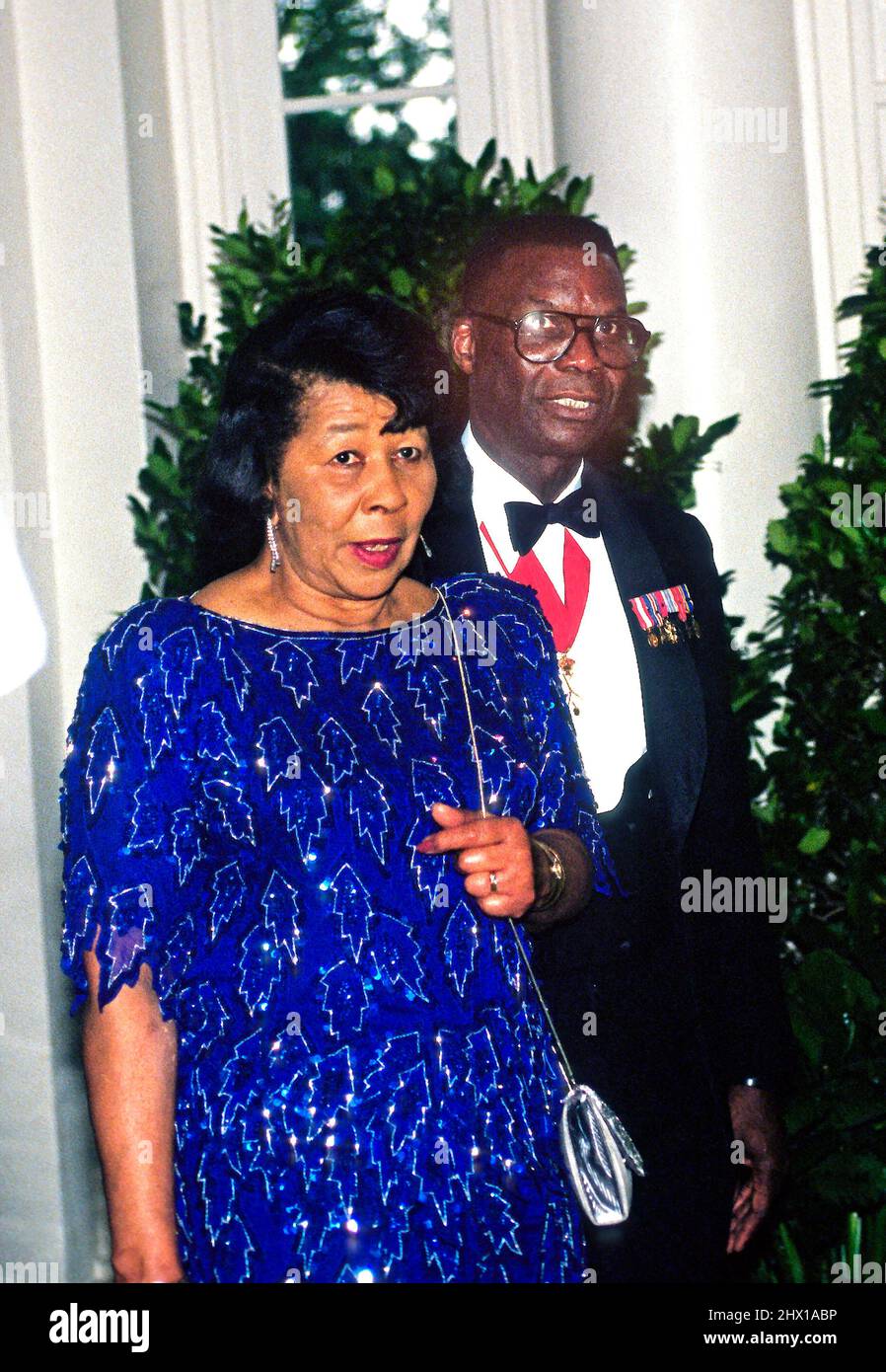 President of Prairie View A&M University and former FEMA Director, United States Army Lieutenant General (Retired) Julius W. Becton, Jr and his wife, Louise, arrive at the White House in Washington, DC for the State Dinner honoring Queen Elizabeth II on May 14, 1991. Credit: Ron Sachs/CNP Stock Photo