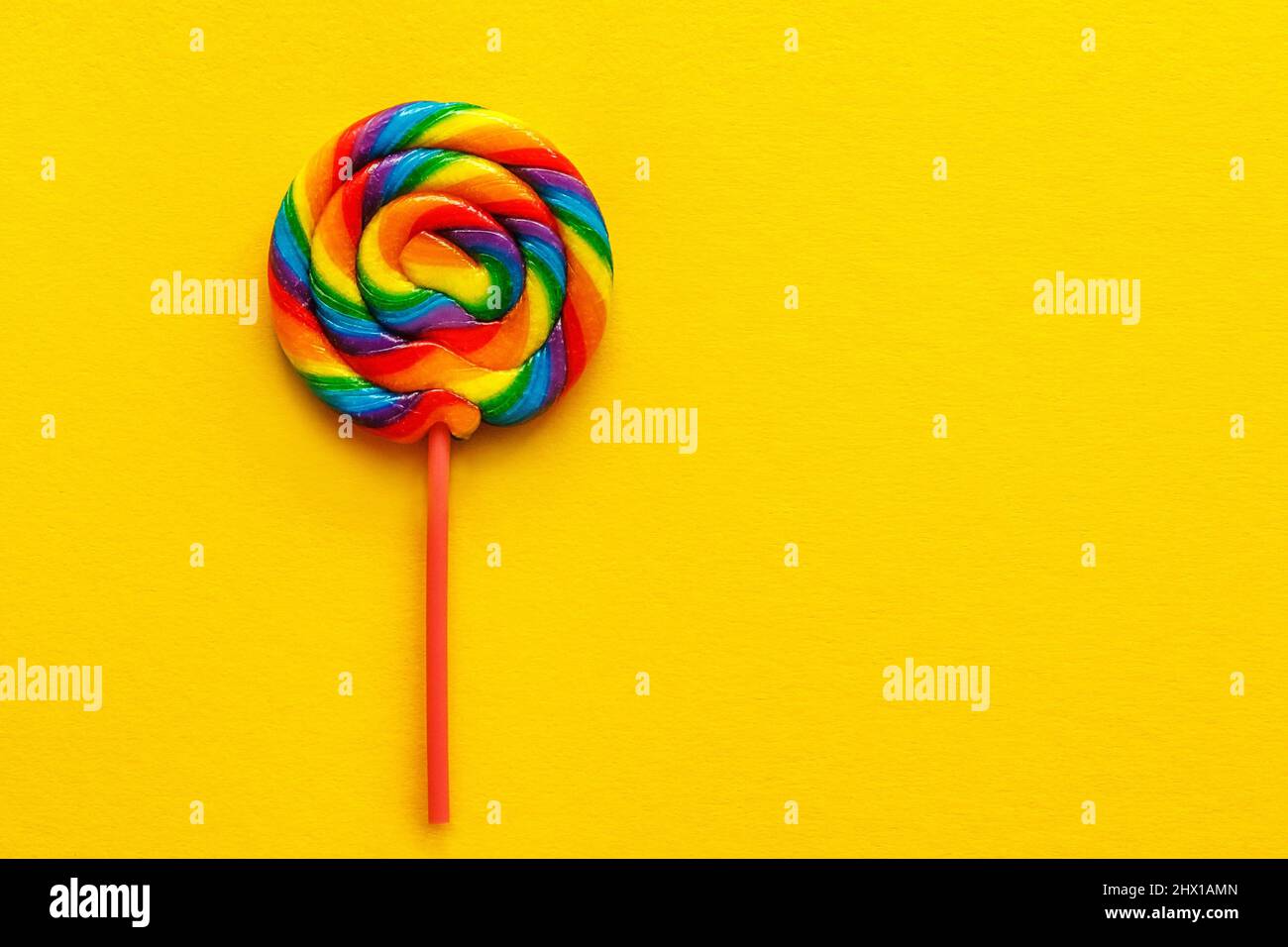 Rainbow swirl lollipop hi-res stock photography and images - Alamy