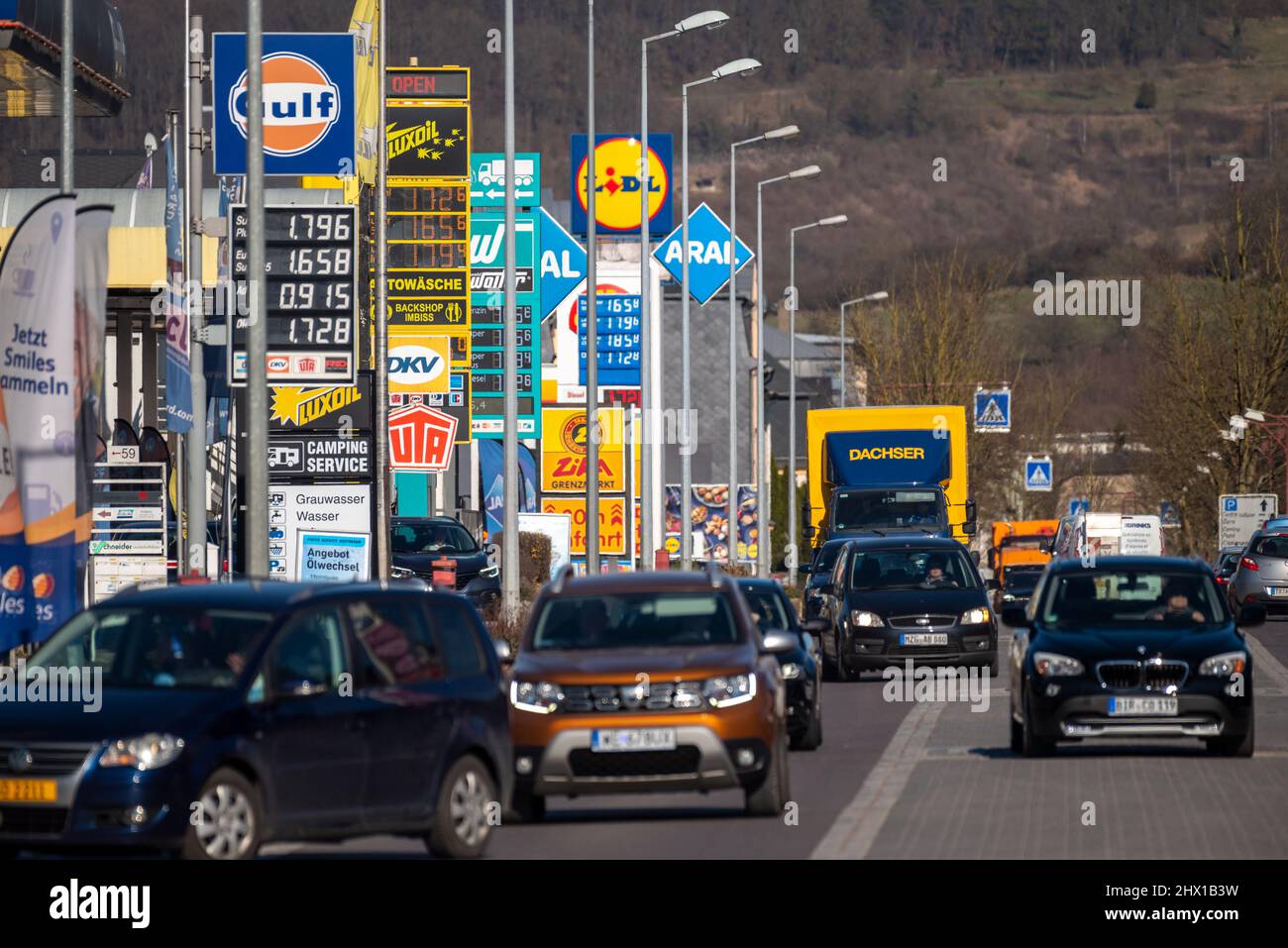 Wasserbillig, Luxembourg. 08th Mar, 2022. Cars drive past gas stations