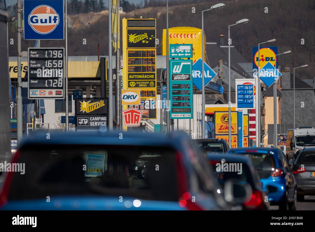 Wasserbillig, Luxembourg. 08th Mar, 2022. Cars drive past gas stations