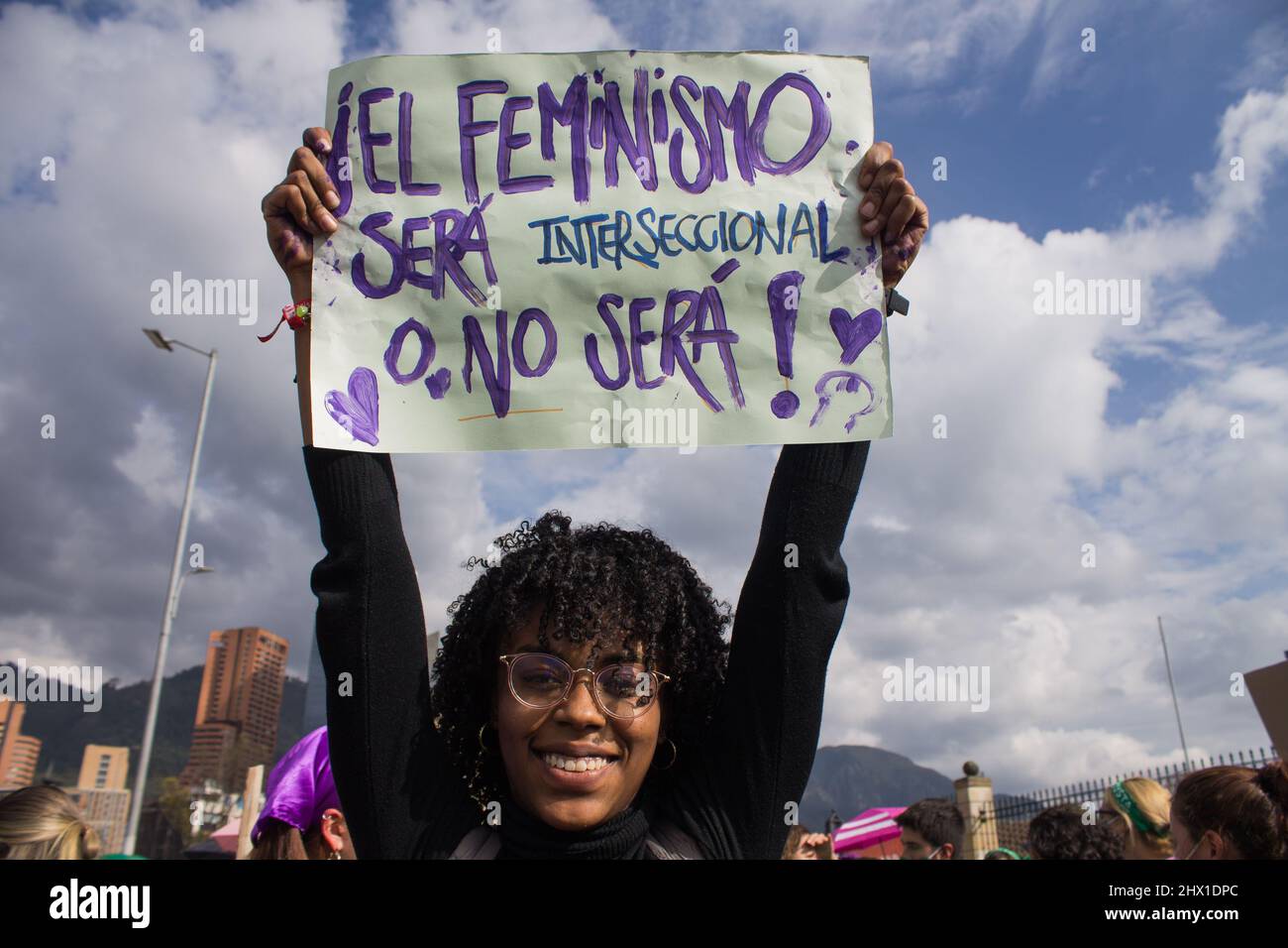 Bogota, Colombia on March 8, 2022. A demonstrator holds a pro-feminist sign as women participate in the international womes day demonstrations in Bogota, Colombia on March 8, 2022. Stock Photo