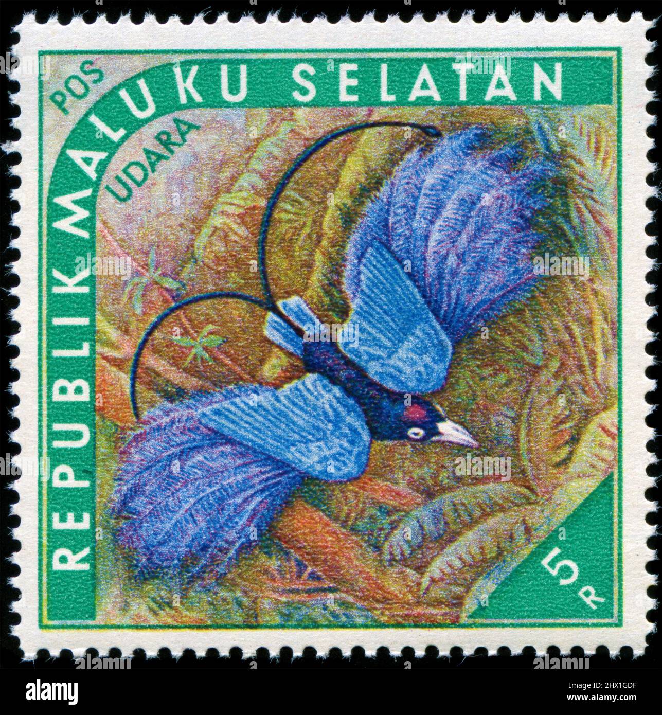Cinderella stamp in the Maluku Selatan series issued in 1952. POS POSTAGE - This is a private issue with a fictitious currency Stock Photo