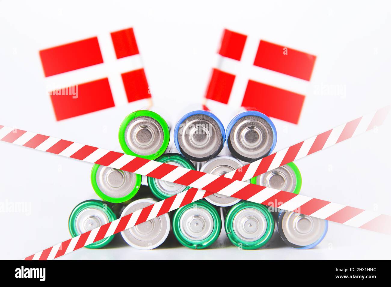 Danish battery ban. Batteries are enclosed with red and white tape. Disposal of waste from