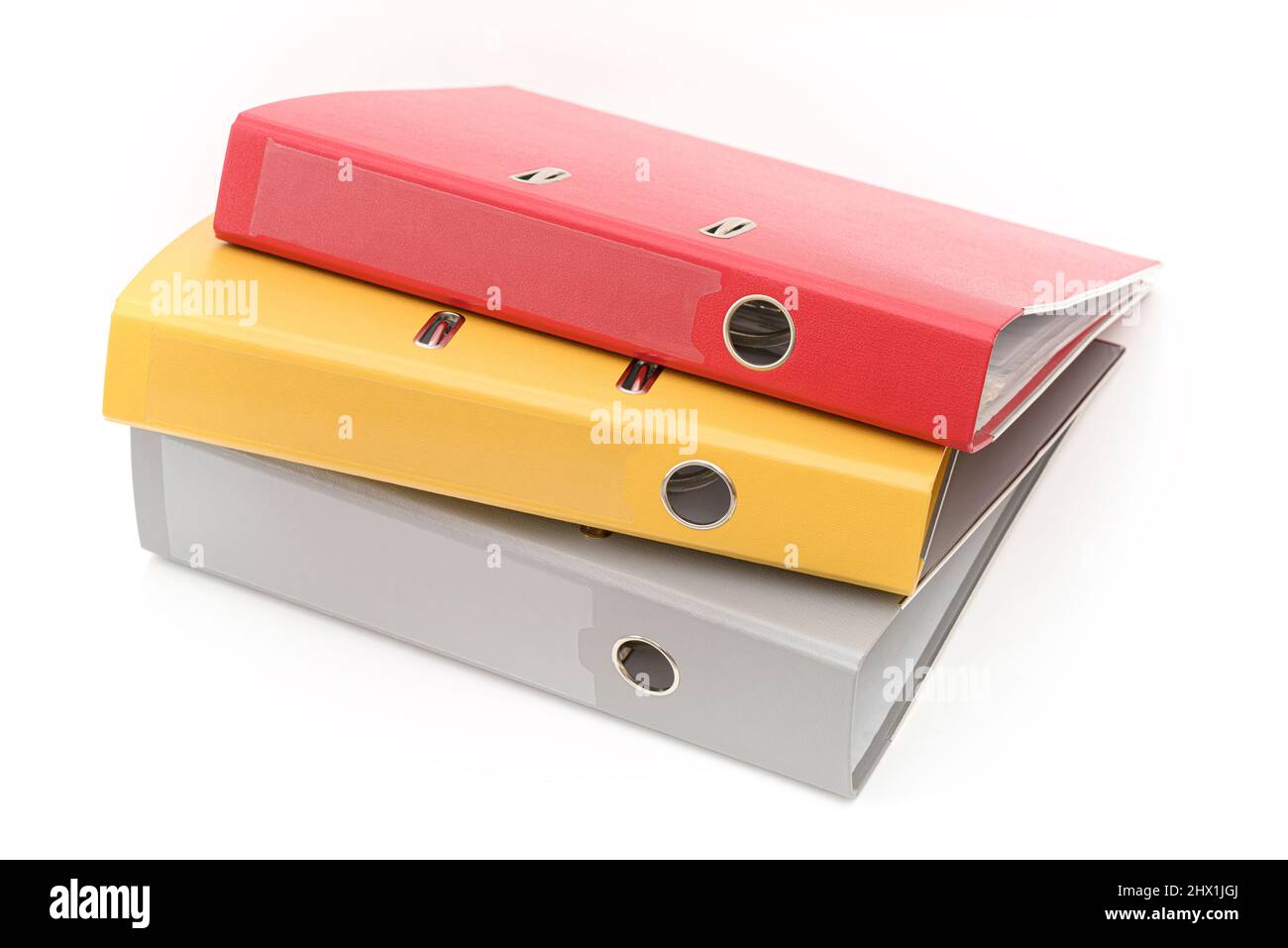 Yellow, gray and red office folder on white background Stock Photo - Alamy