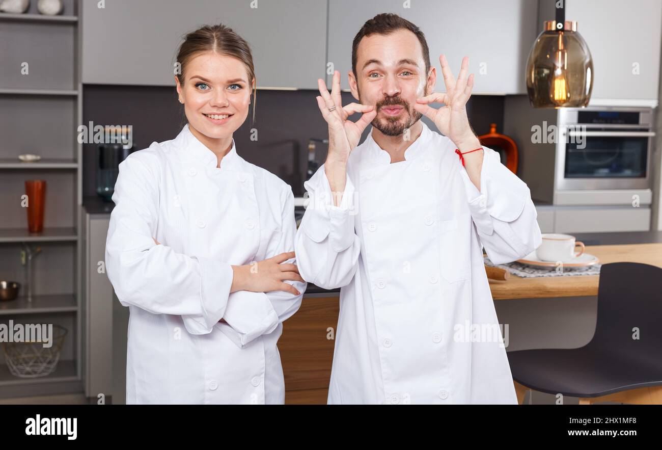Professional chefs in white uniform Stock Photo Alamy