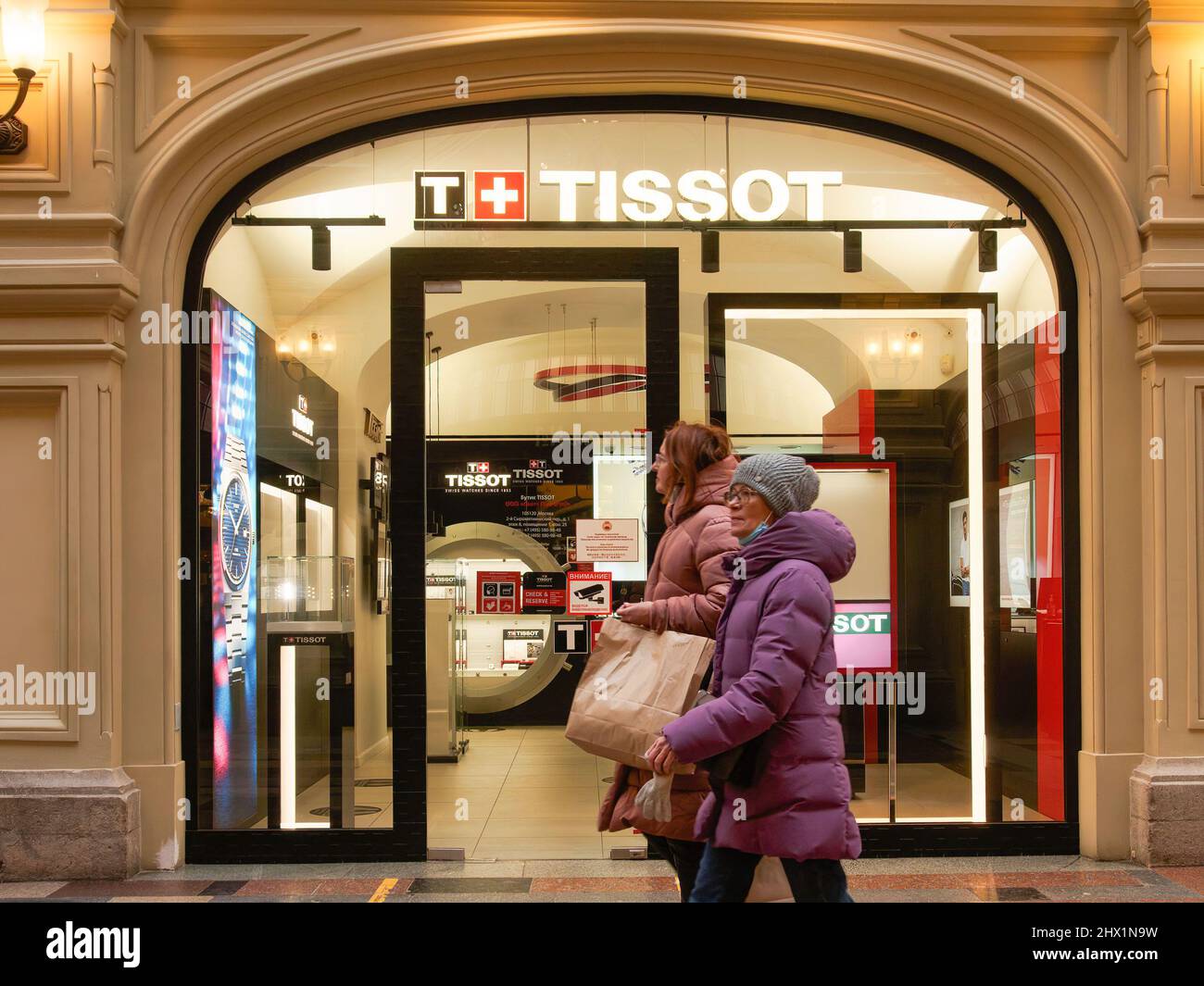 Moscow, Russia. 08th Mar, 2022. Shoppers walk past a closed Tissot boutique. In the first days of March, many brands announced the termination of their activities in Russia and the closure of stores. Credit: SOPA Images Limited/Alamy Live News Stock Photo