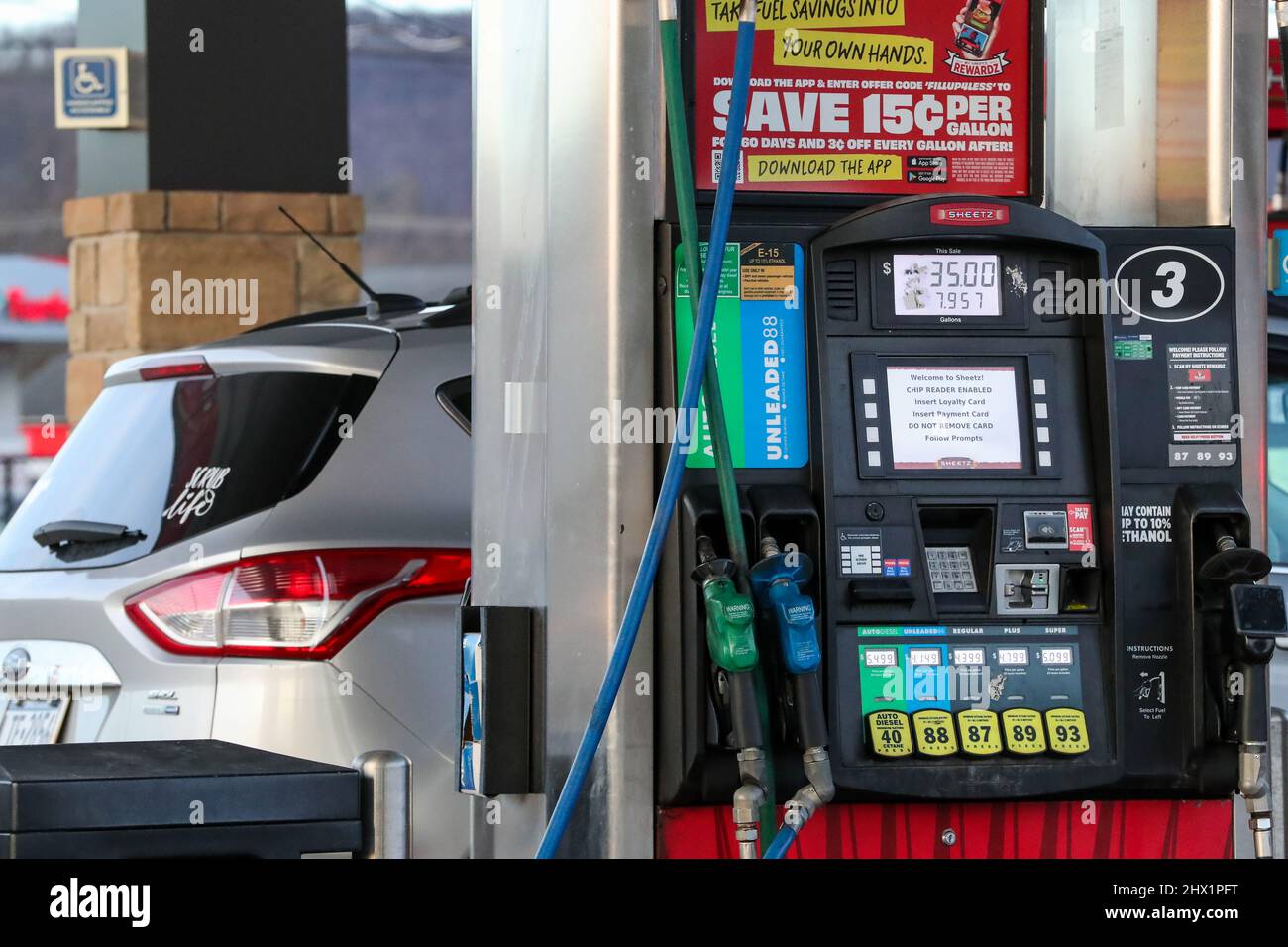 Gasoline prices are displayed on a pump at a Sheetz gas station. AAA