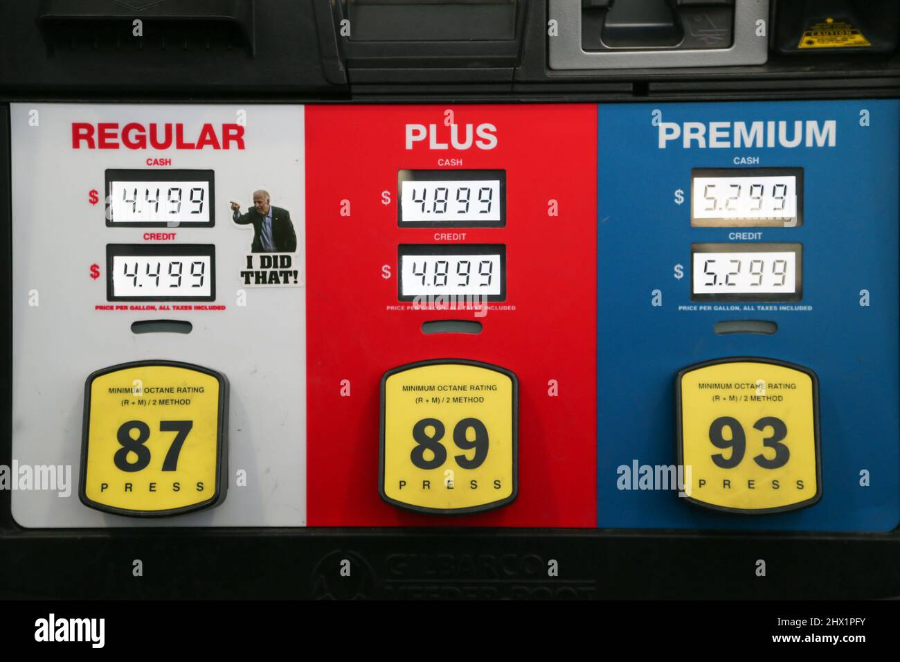 A sticker of US President Joe Biden is placed on a gas pump at a Turkey