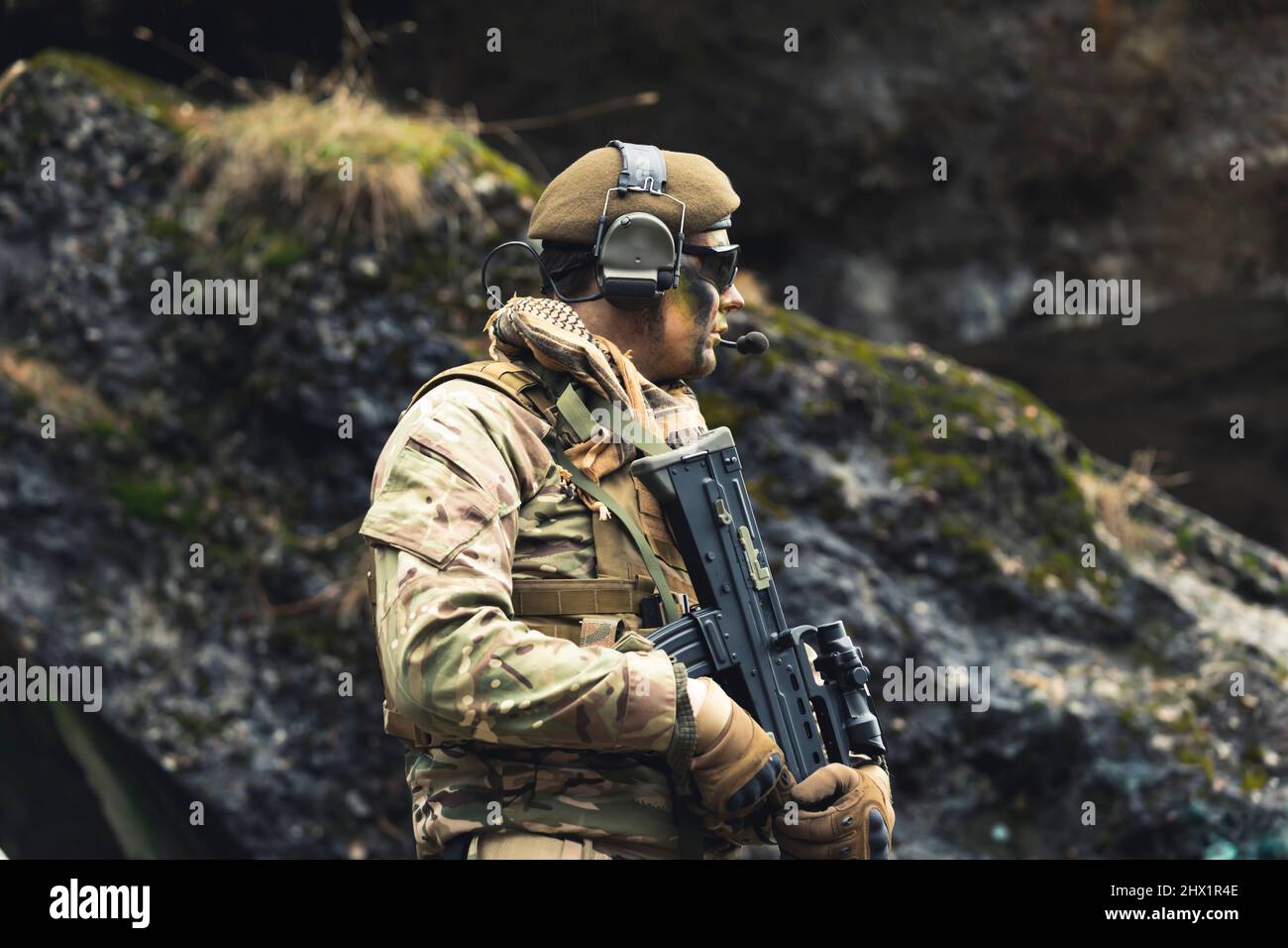 Engrossed on battlefield defending cave borders as a veteran. High quality photo Stock Photo