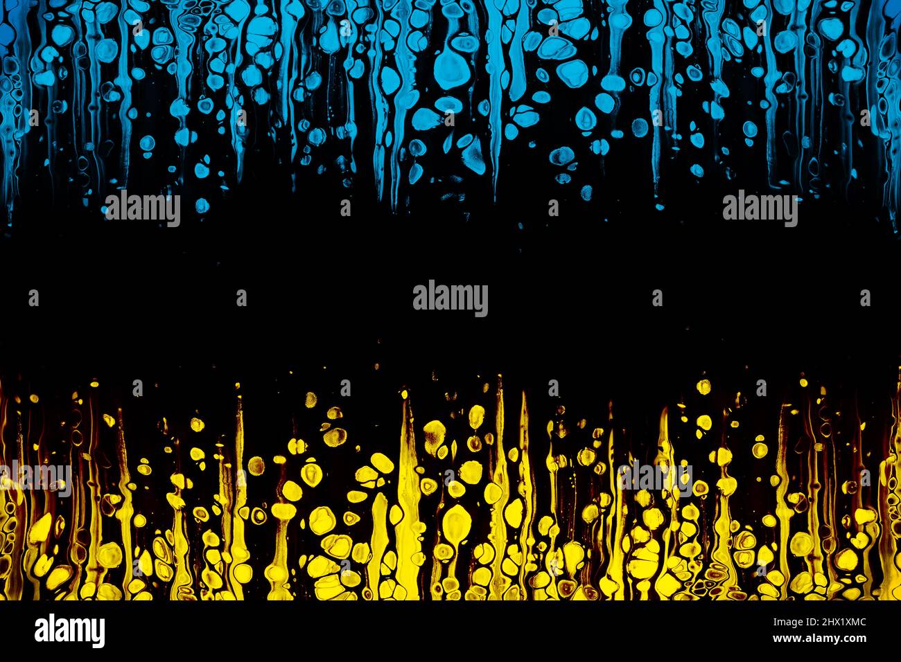 Blue and yellow abstract acrylic dripping painting  in Colors of Ukrainian Flag Stock Photo
