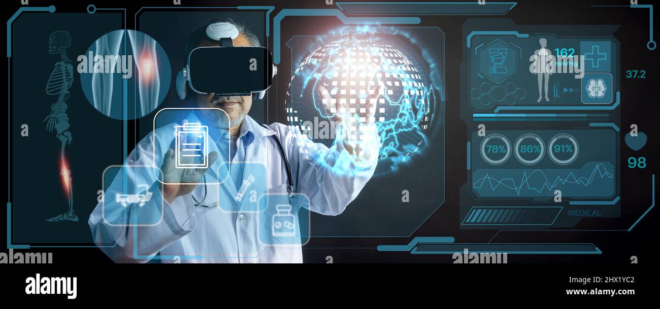 Digital medical health futuristic and global metaverse technology, doctor wearing best VR headset equipment to check internal organs patient on screen Stock Photo