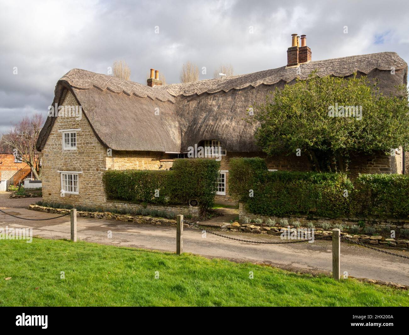 Traditional thatched cottage in the canal village of Stoke Bruerne