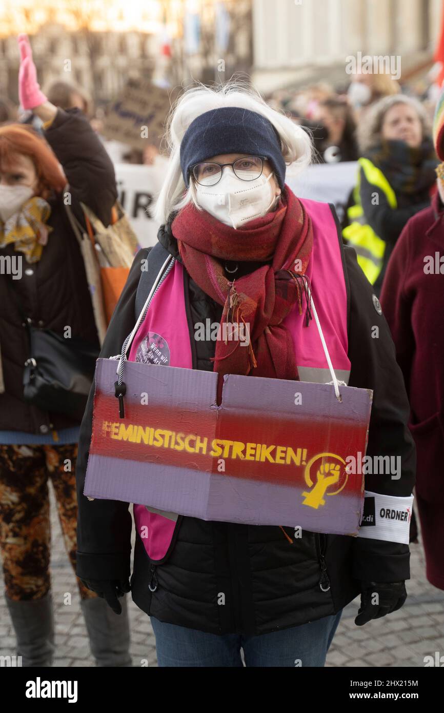 Munich, Germany. 08th Mar, 2022. Participant with sign "Feminist Strike".  On March 8, 2022, hundreds of participants gathered at Koenigsplatz in  Munich, Germany, on International Women's Day, for a feminist strike. (Photo