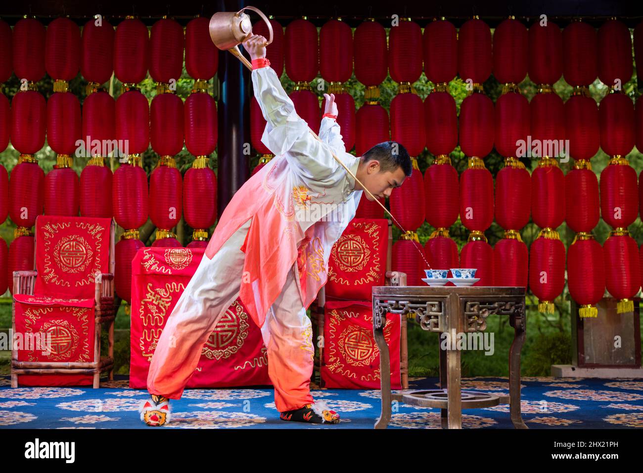Sichuan opera tea serving performer in a Chinese teahouse Stock Photo