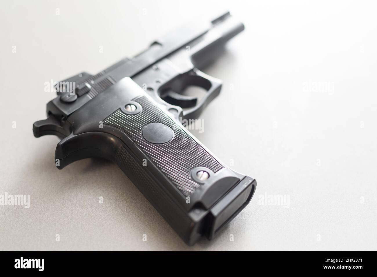 Pistol isolated on white background Stock Photo - Alamy