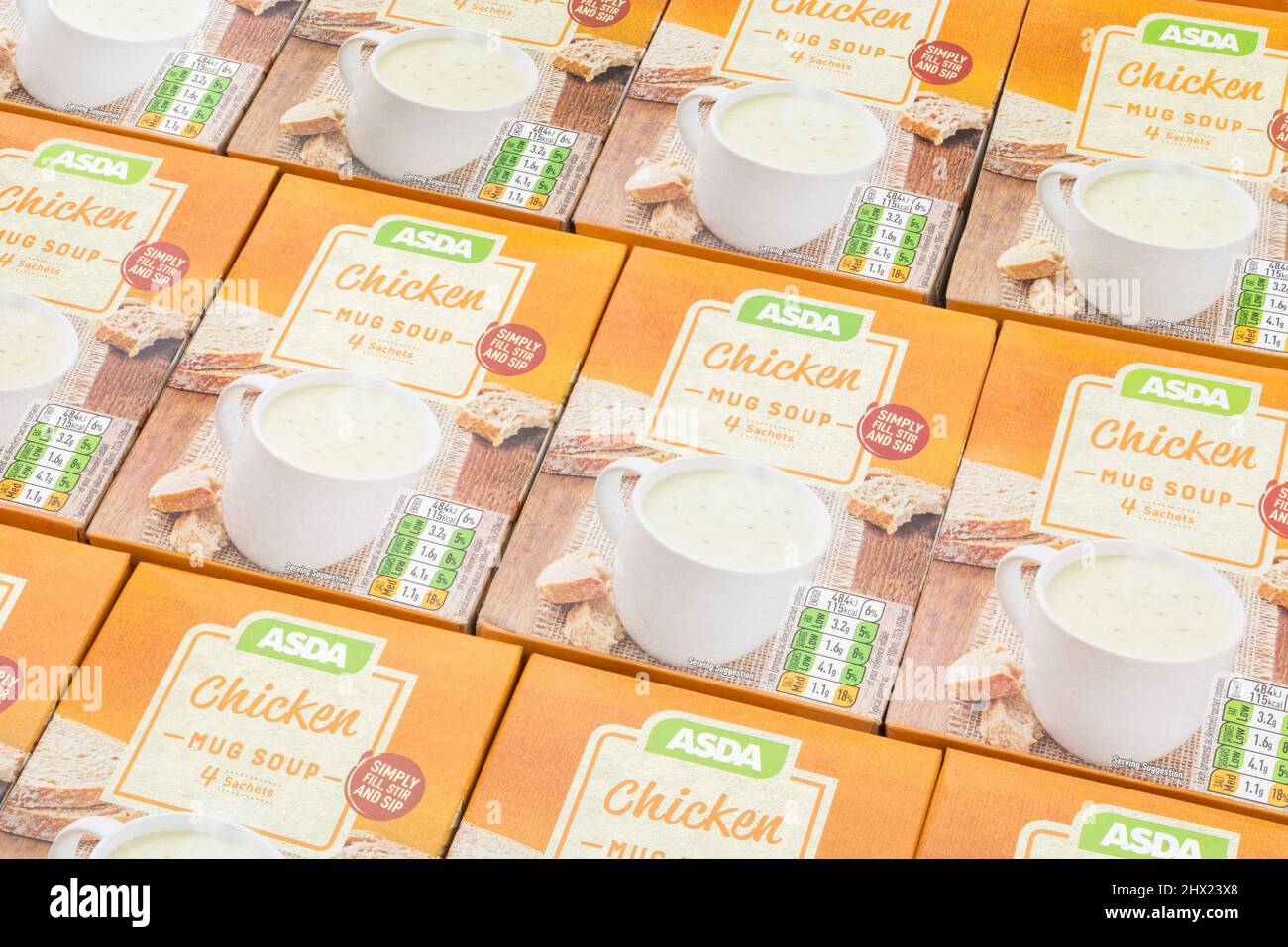 Neatly aligned ASDA ownlabel instant chicken soup in card boxes. For