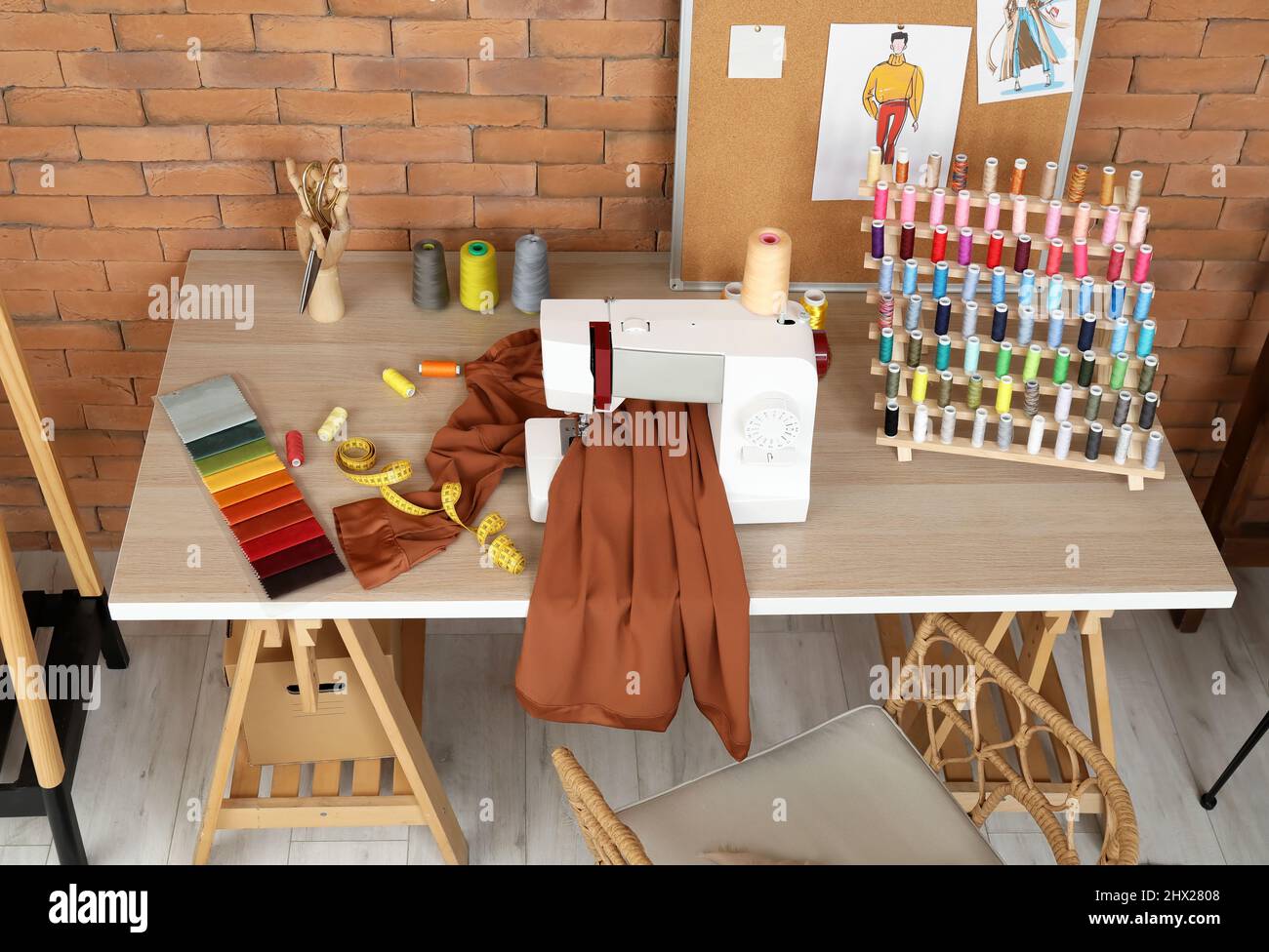Tailor's workplace in modern atelier Stock Photo Alamy