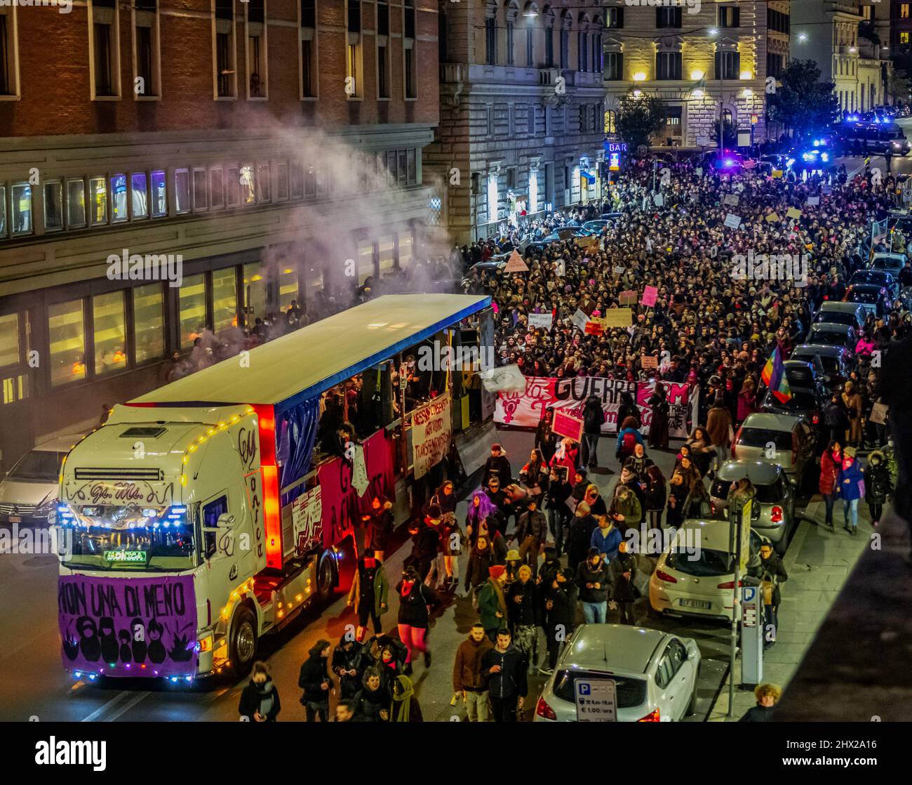 Women's day celebration march in the historic center of Rome. Furthermore, it is marching against homophobia, transphobia and gender-based violence. Stock Photo