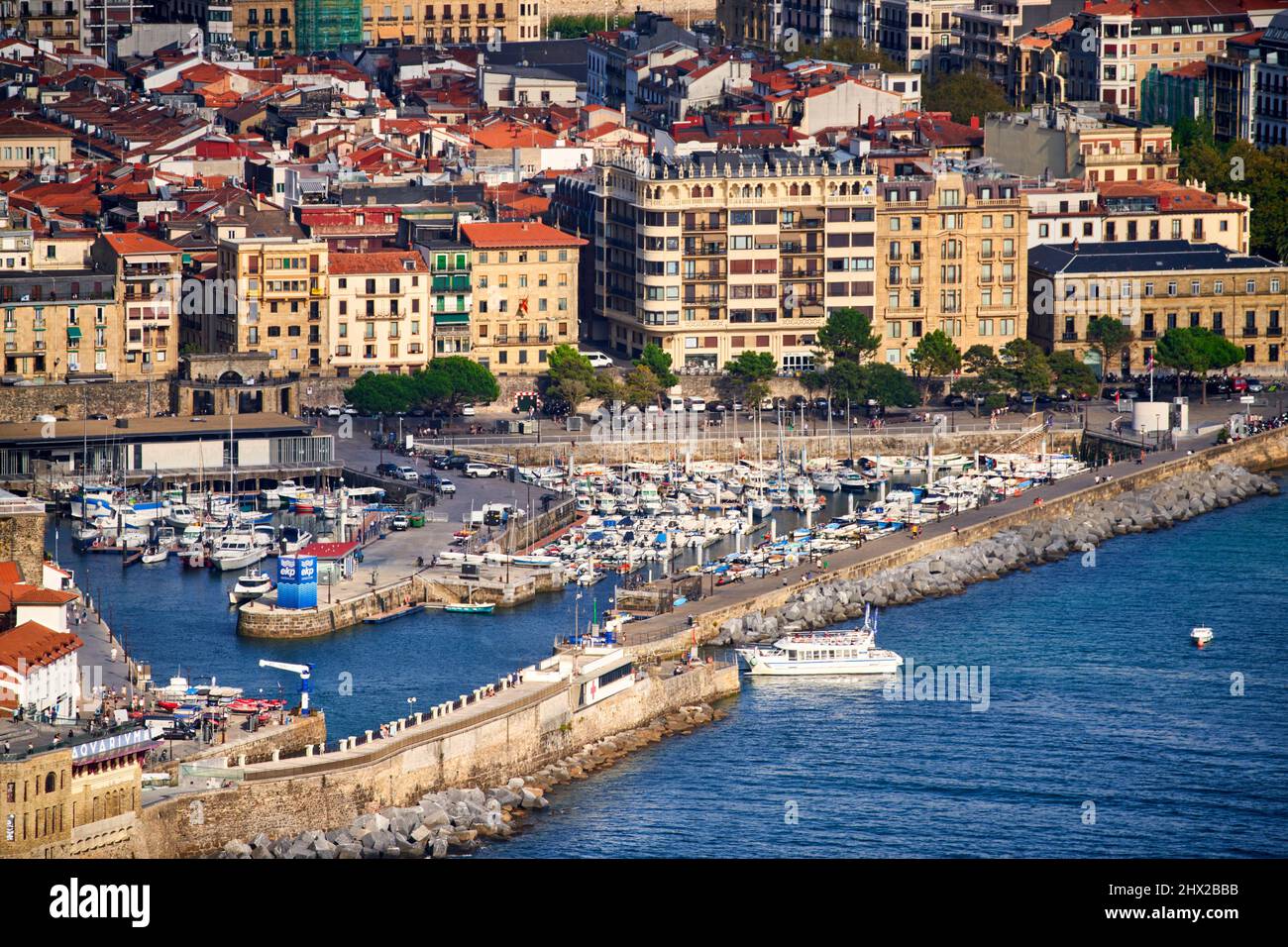 Tourist boat entering the Port, Behind the Old Town, Donostia, San Sebastian, cosmopolitan city of 187,000 inhabitants, noted for its gastronomy, Stock Photo