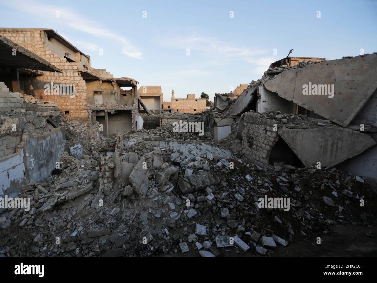 A general view shows damaged buildings in the rebel-held town of Tadef, on a frontline between Russian-backed Syrian government forces and Turkey-backed Syrian rebel-held territory, in northern Syria March 4, 2022. Picture taken March 4, 2022. REUTERS/Khalil Ashawi Stock Photo