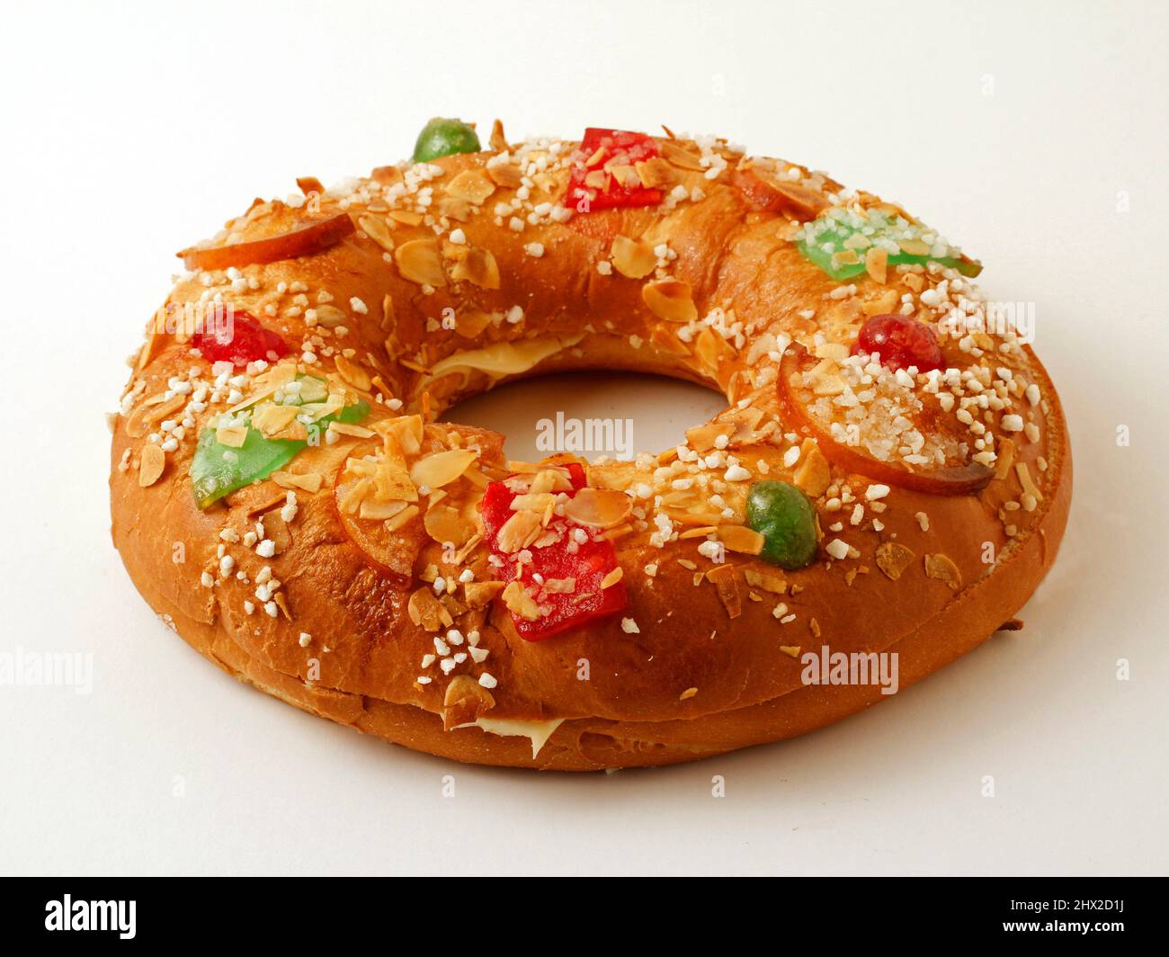 Roscón de Reyes with custard. Typical Hispanic pastry.  . Stock Photo