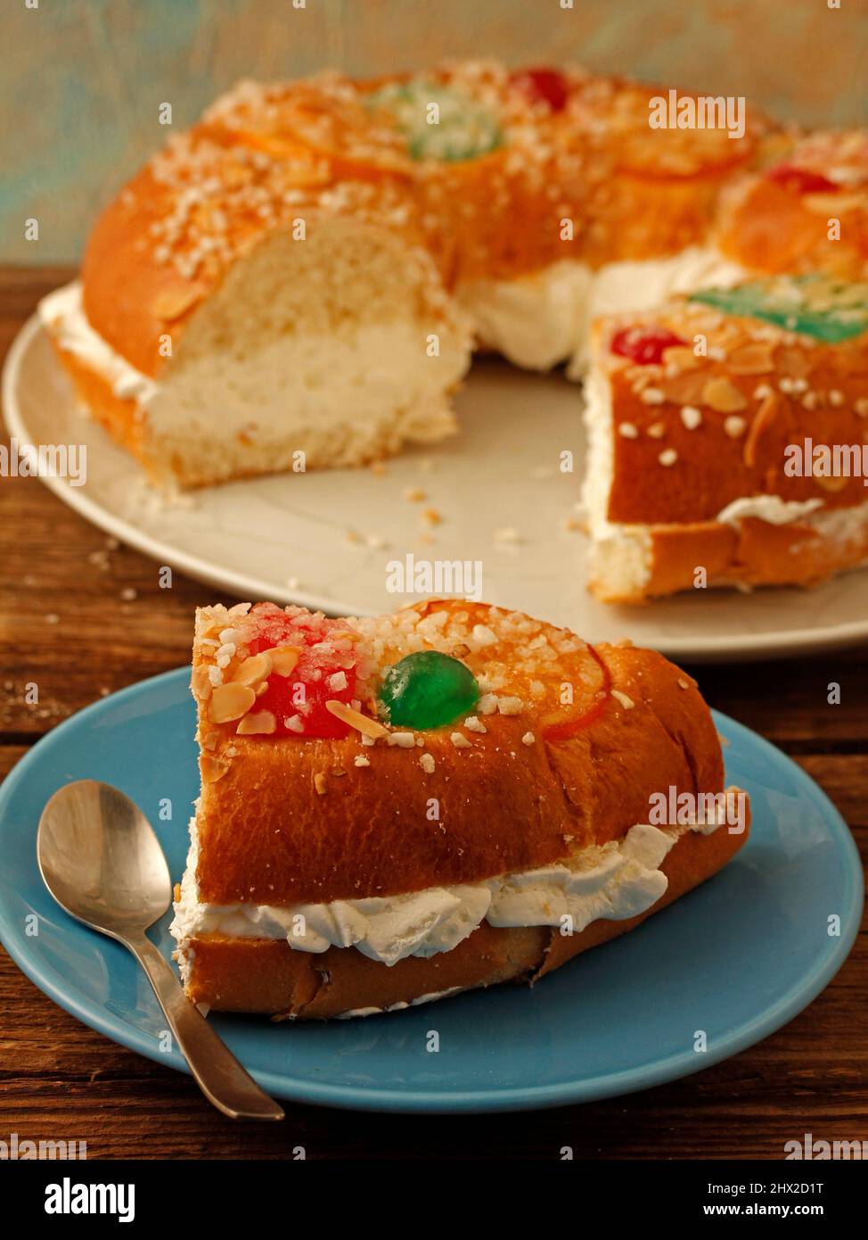 Roscón de Reyes with cream. Typical hispanic pastry.  . Stock Photo