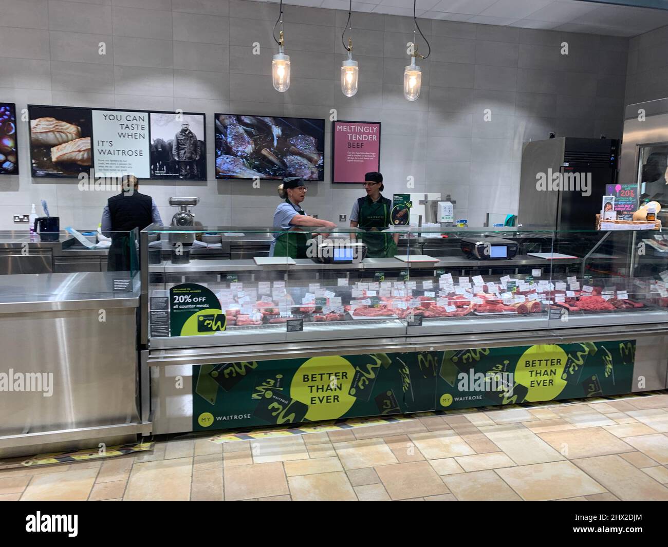 Meat counter at Waitrose Rushden Lakes Northamptonshire UK Stock Photo