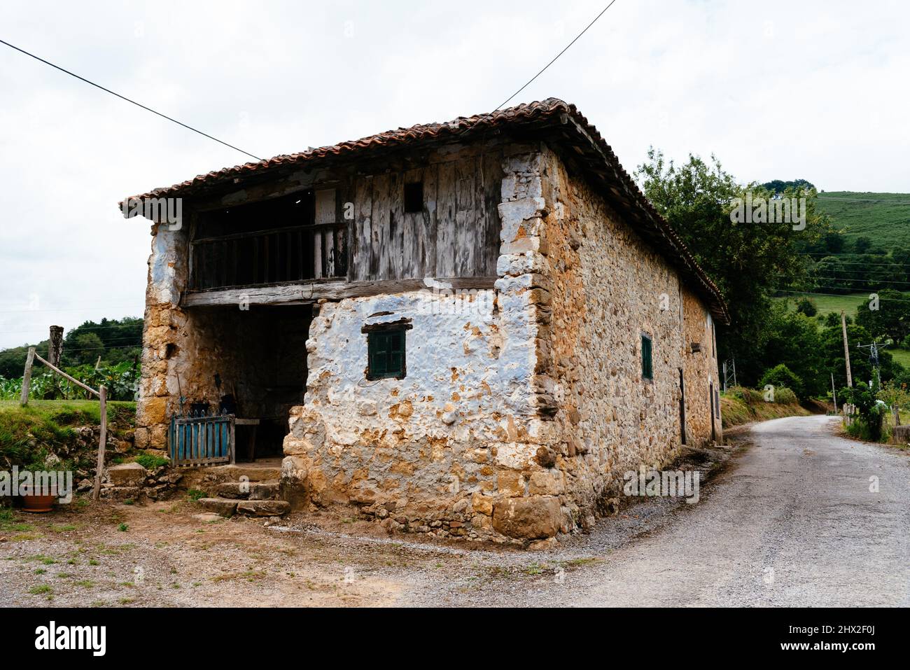 Traditional farm building in the valley in Asturias, Spain. Stock Photo