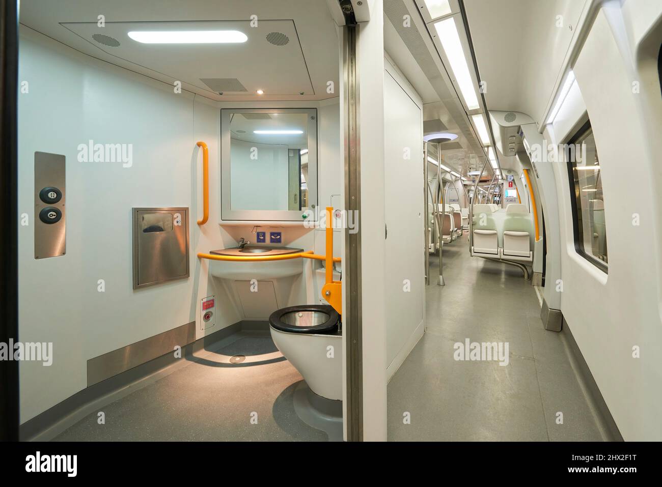 View of the toilets and corridor in a modern train without people Stock