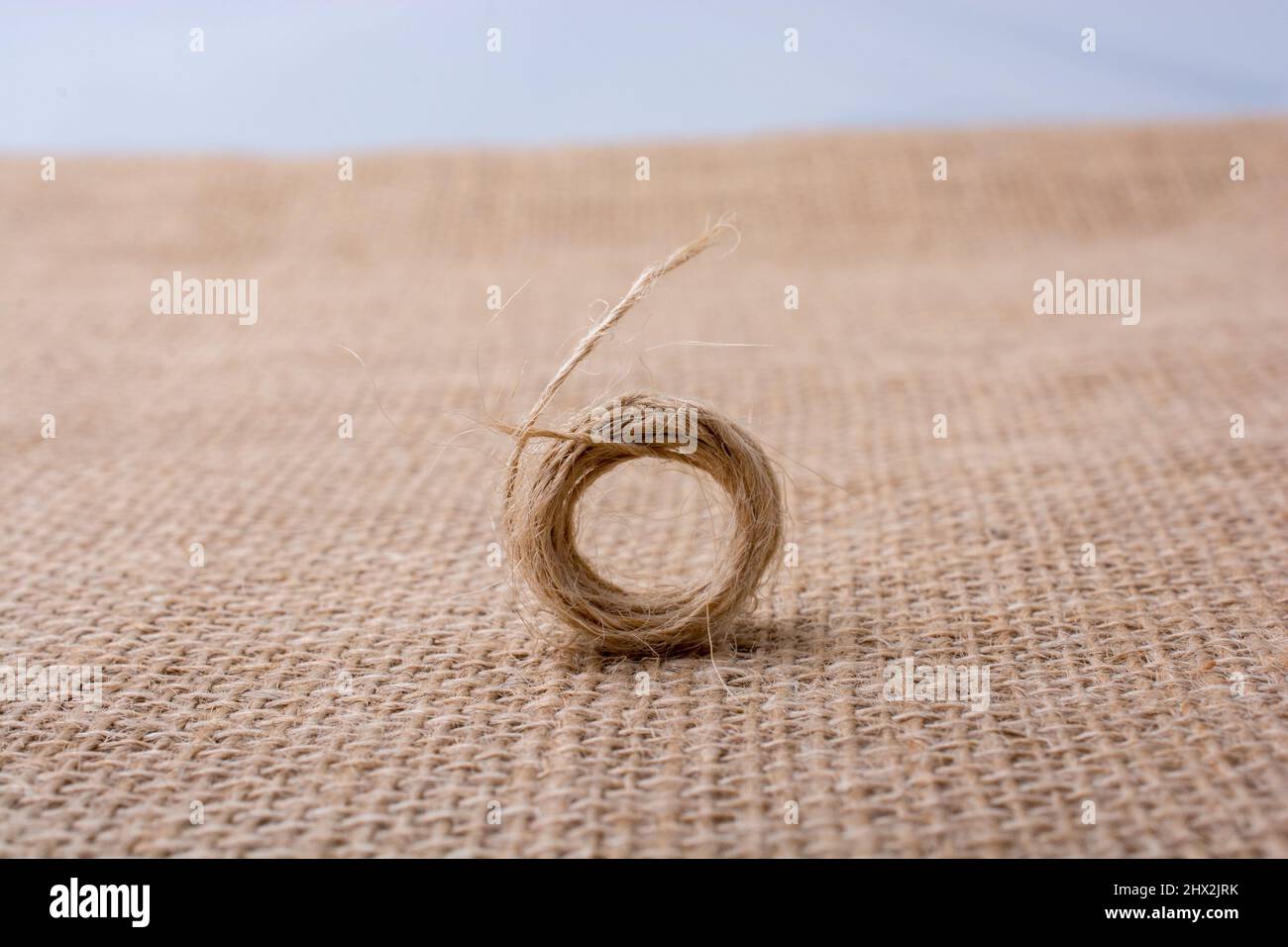 Roll of brown color linen string paper background Stock Photo Alamy