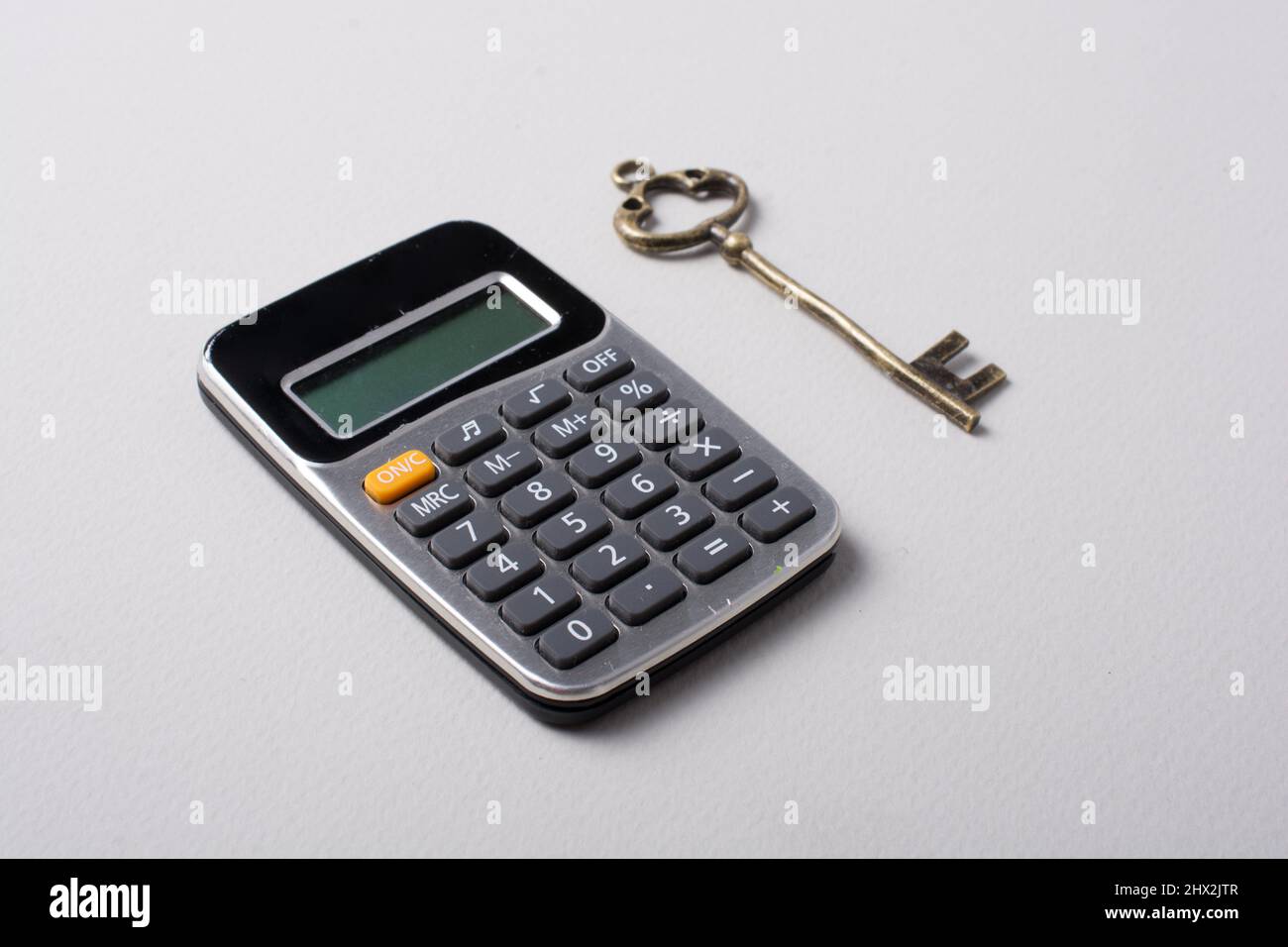 Little size calculator placed on white background Stock Photo Alamy