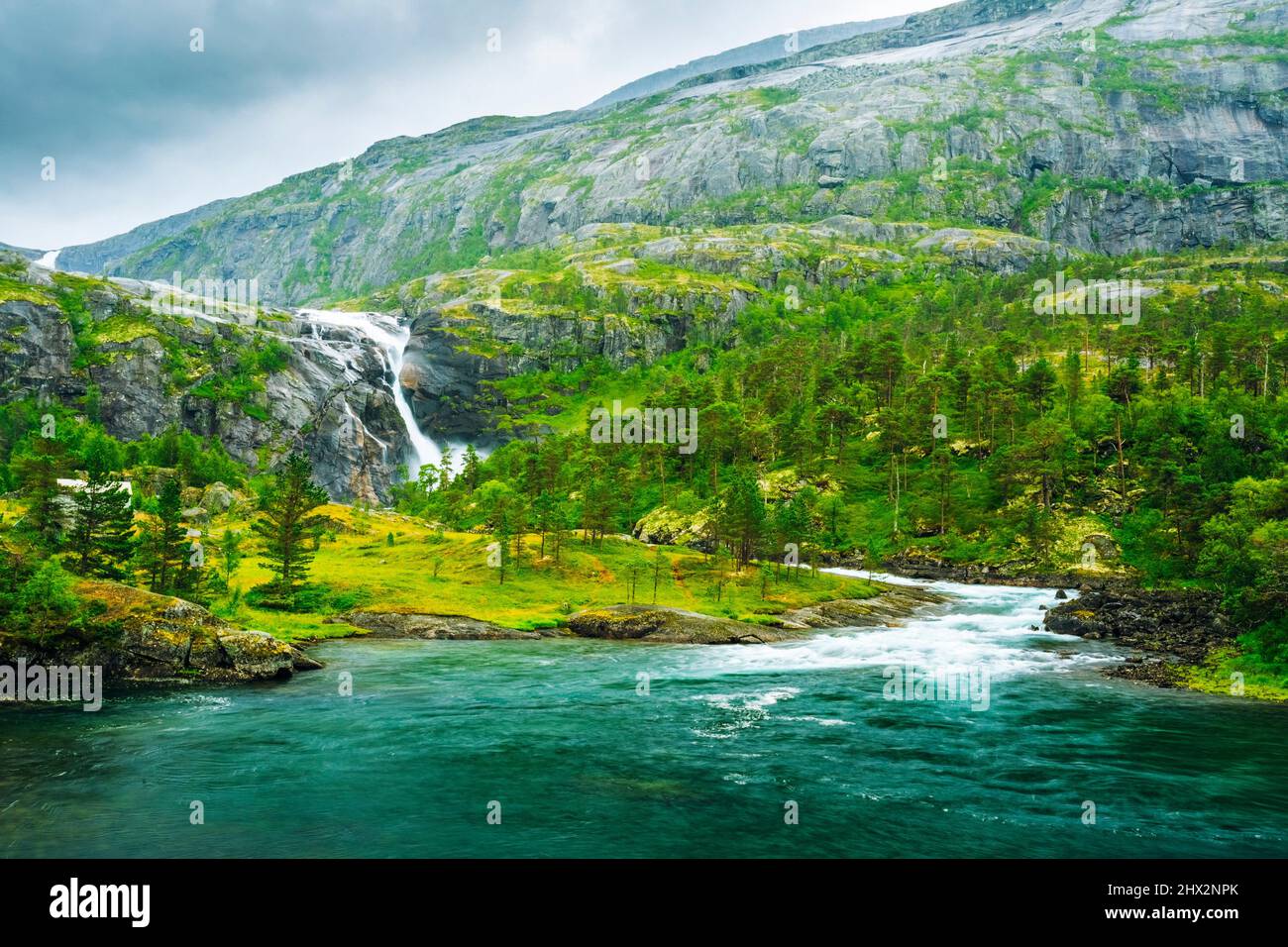 Giant Waterfall in the Valley of waterfalls in Norway. Husedalen