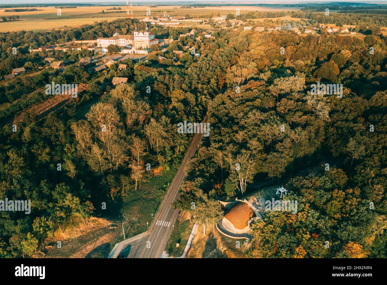 Aerial View Of Jesuit Collegium Complex. Top View Of Parking Lot Of Primitive Man Upper Period Of The Paleolithic 26 Thousand Years Ago. Drone View Stock Photo