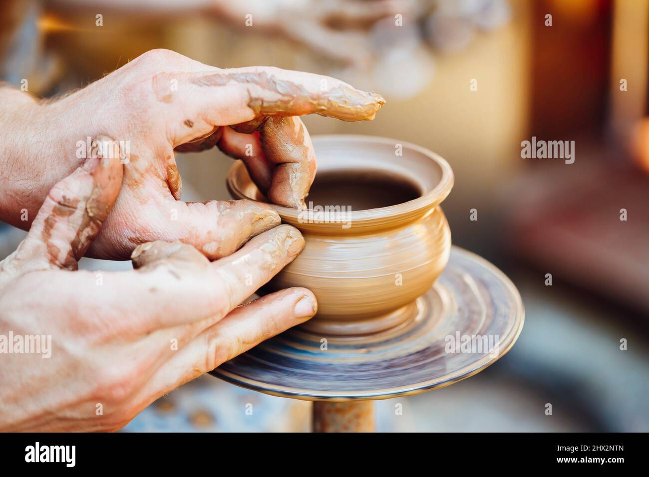 Process Of Creating A Clay Pot. Using Hands. Pottery Craft Wheel And