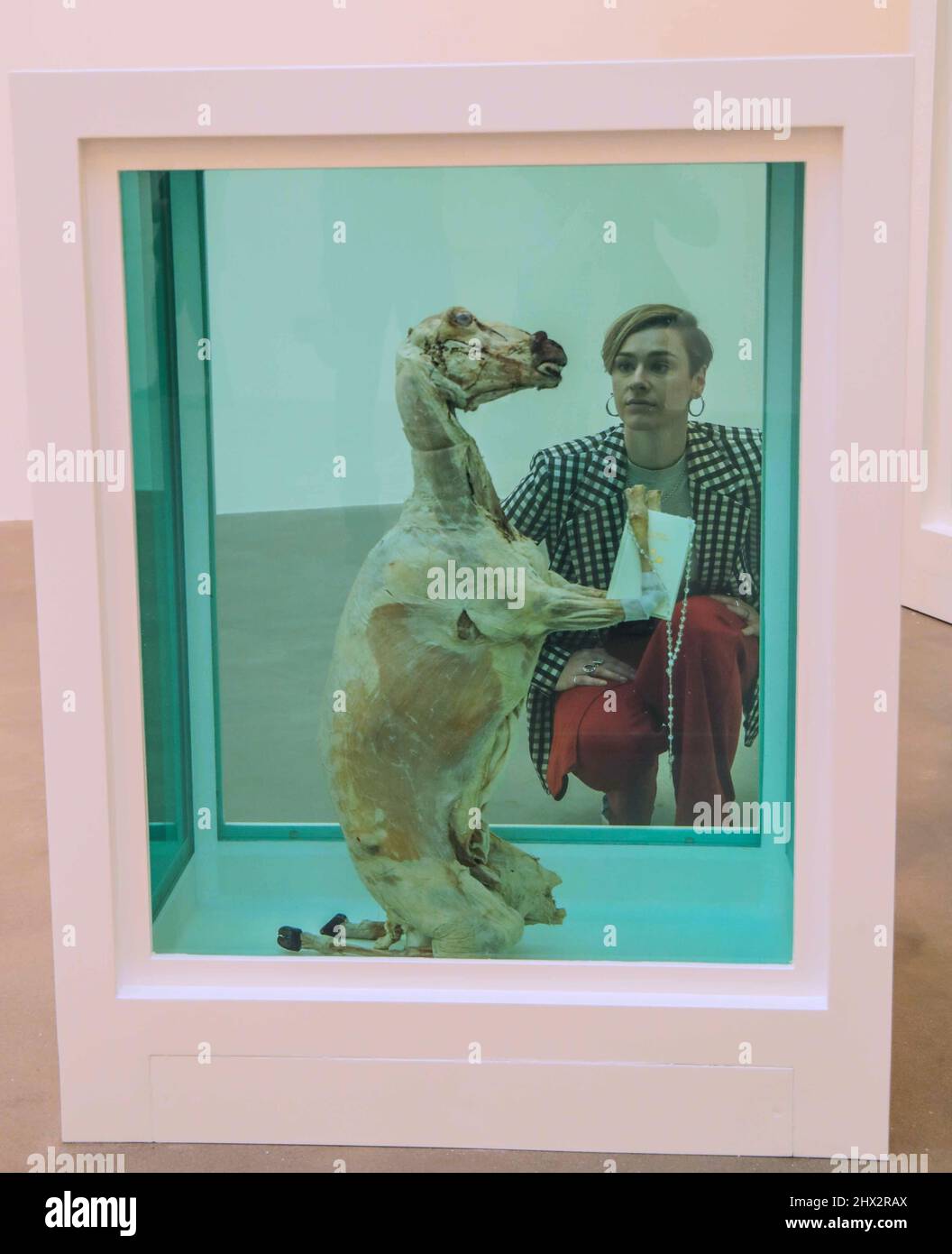 London UK 09 March 2022 Our Father Who art in heaven, 2005,Glass,painted aluminum, ,silicone prayer book, ,silver rosary bead, ,plastic cable ties, ,,sheep and formaldehyde solution First Exhibition dedicated to Damien Hirst's London UK 09 March 2022 Our Father Who art in heaven, 2005,Glass,painted aluminum, ,silicone prayer book, ,silver rosary bead, ,plastic cable ties, ,,sheep and formaldehyde solution First Exhibition dedicated to Damien Hirst's