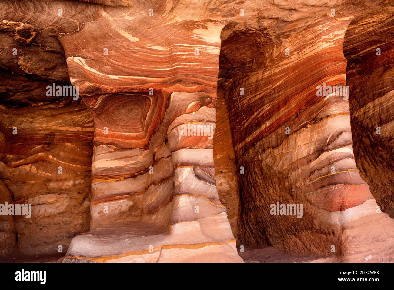 Petra, multicoloured sandstone with cross-bedding. UNESCO World Heritage, Nabataean site, Jordan. Stock Photo
