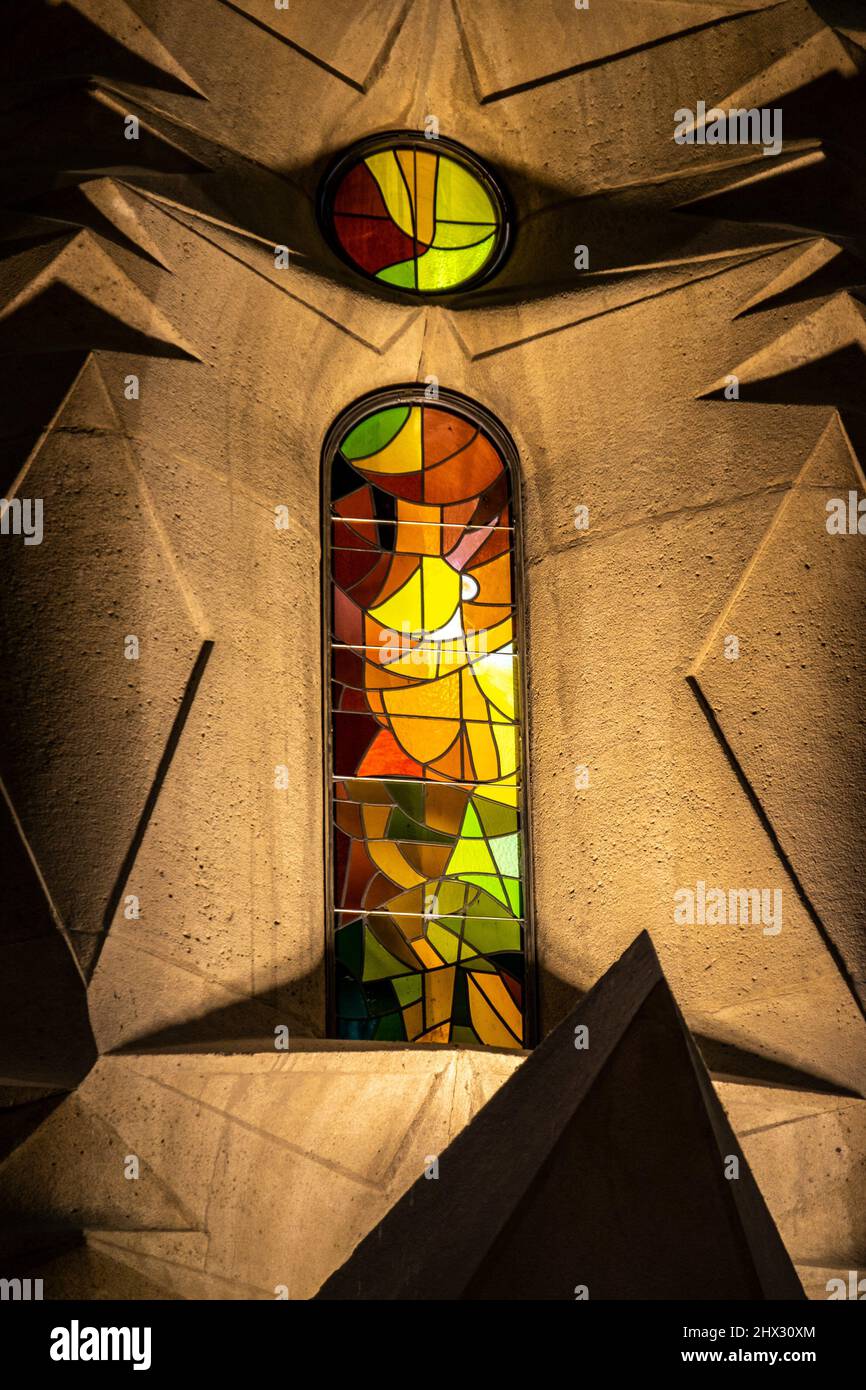 The famous stainedglass windows inside the Sagrada Familia by Antoni Gaudi in Barcelona, Spain