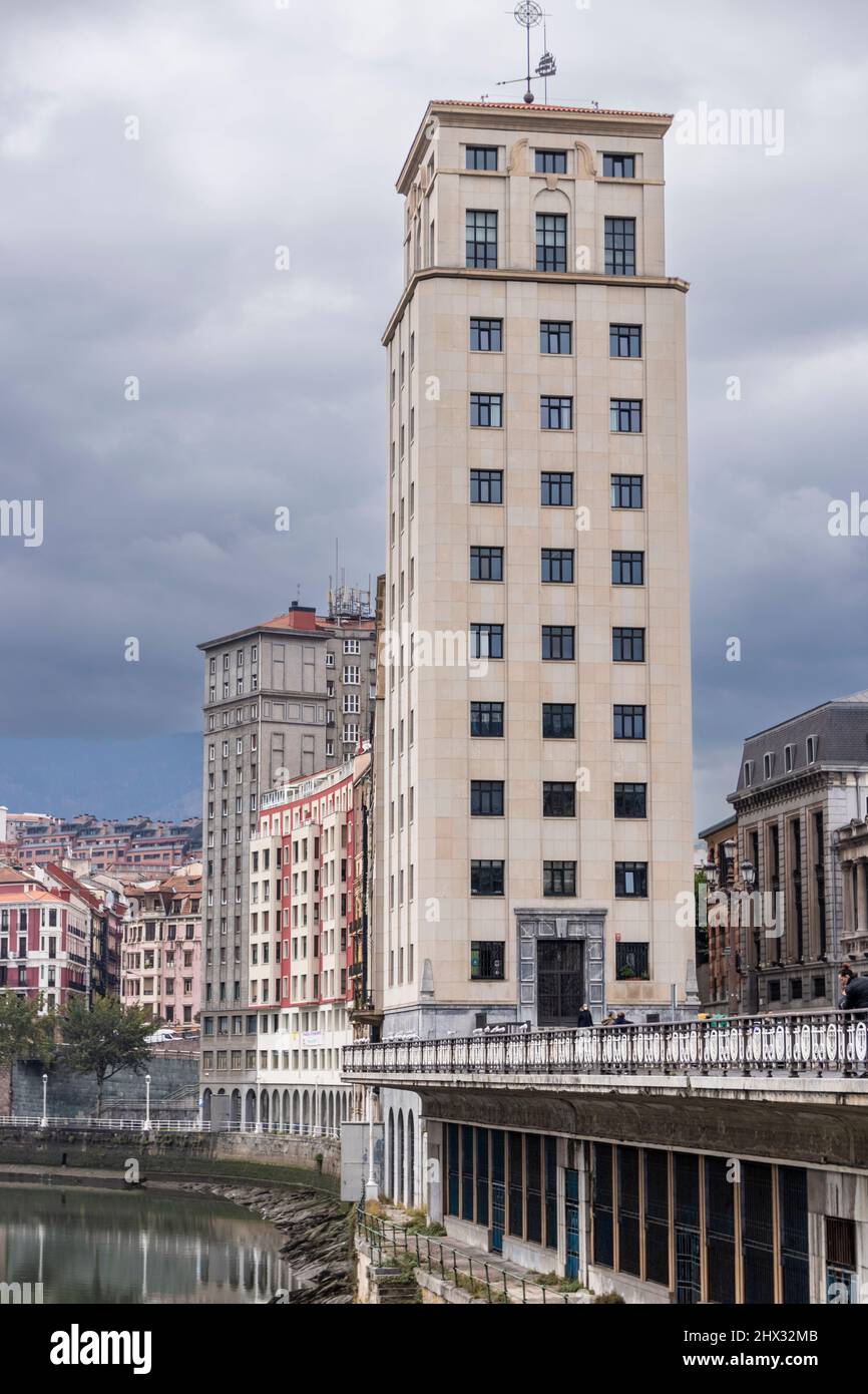 old building on the bank of the ria de bilbao in the north of spain ...