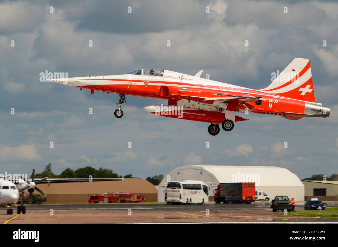 Northrop F-5E Tiger II of Patrouille Suisse, Swiss display team fighter jet plane arriving at Royal International Air Tattoo airshow, UK, RAF Fairford Stock Photo