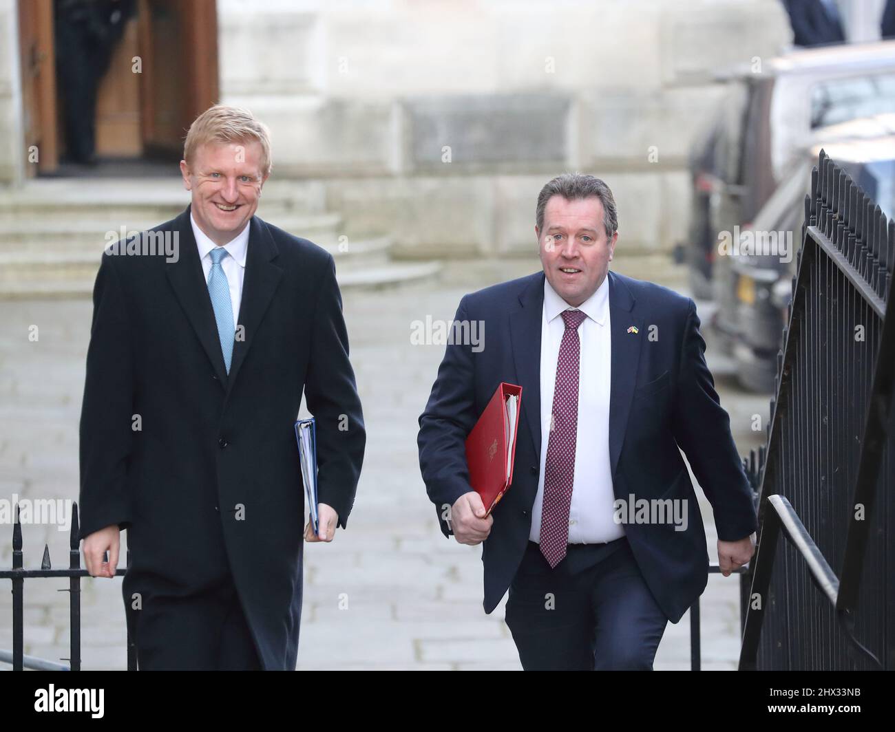 London, UK, 8th March 2022. Leader of the House of Commons Mark Spencer and Minister Oliver Dowden arriving for the weekly Cabinet Meeting at No 10 Downing Street Stock Photo