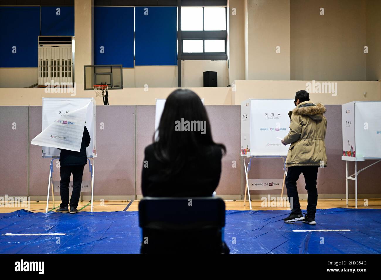 An election official monitors a polling station in the Mok-dong neighborhood of Seoul, South Korea during the presidential election on Wednesday, March 9, 2022. The two main candidates are Lee Jae-myung of the Democratic Party and Yoon Suk-yeol of the People Power Party. Photo by Thomas Maresca/UPI Stock Photo