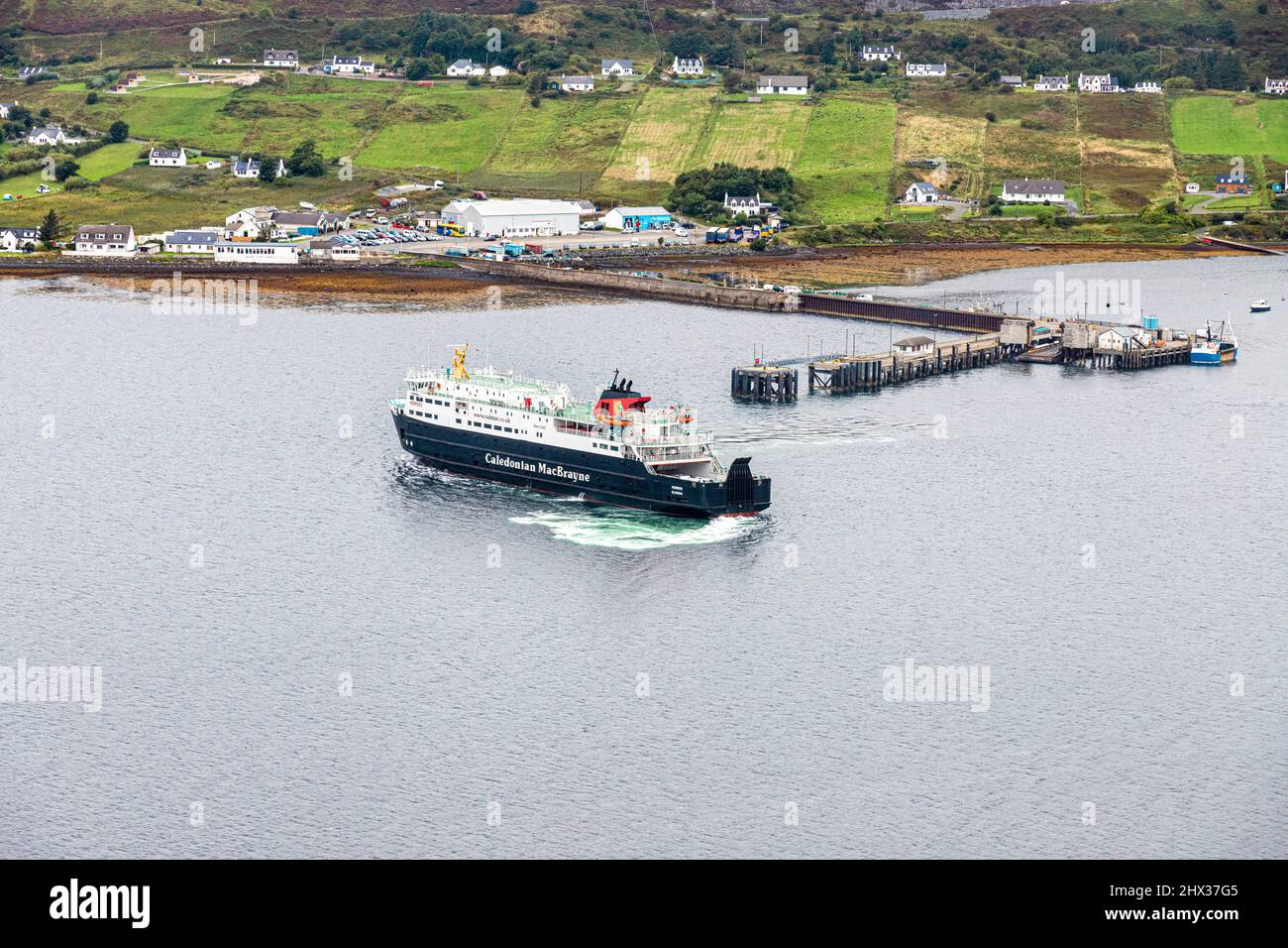 The MV Hebrides CalMac ferry setting out for Tarbert on the Isle of Harris from Uig in the north of the Isle of Skye, Highland, Scotland UK. Stock Photo