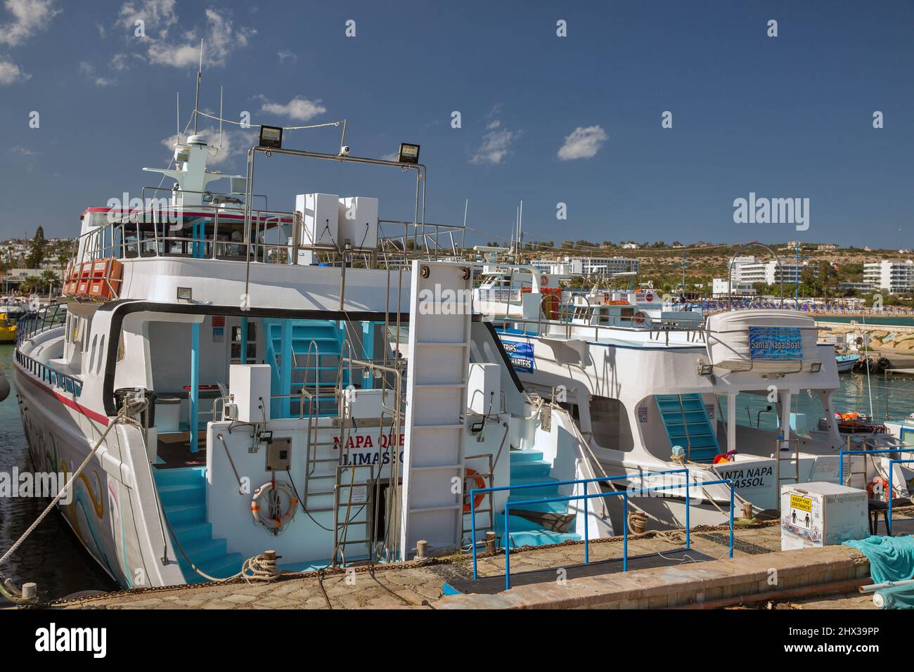 Ayia Napa, Cyprus - May 23, 2021: Pleasure yachts moored in seaport. Ayia Napa is a tourist resort at the far eastern end of the southern coast of Cyp Stock Photo