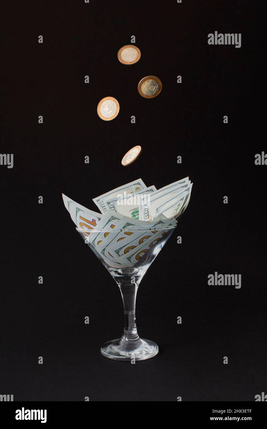 Savings concept gold coins falling hi-res stock photography and images ...