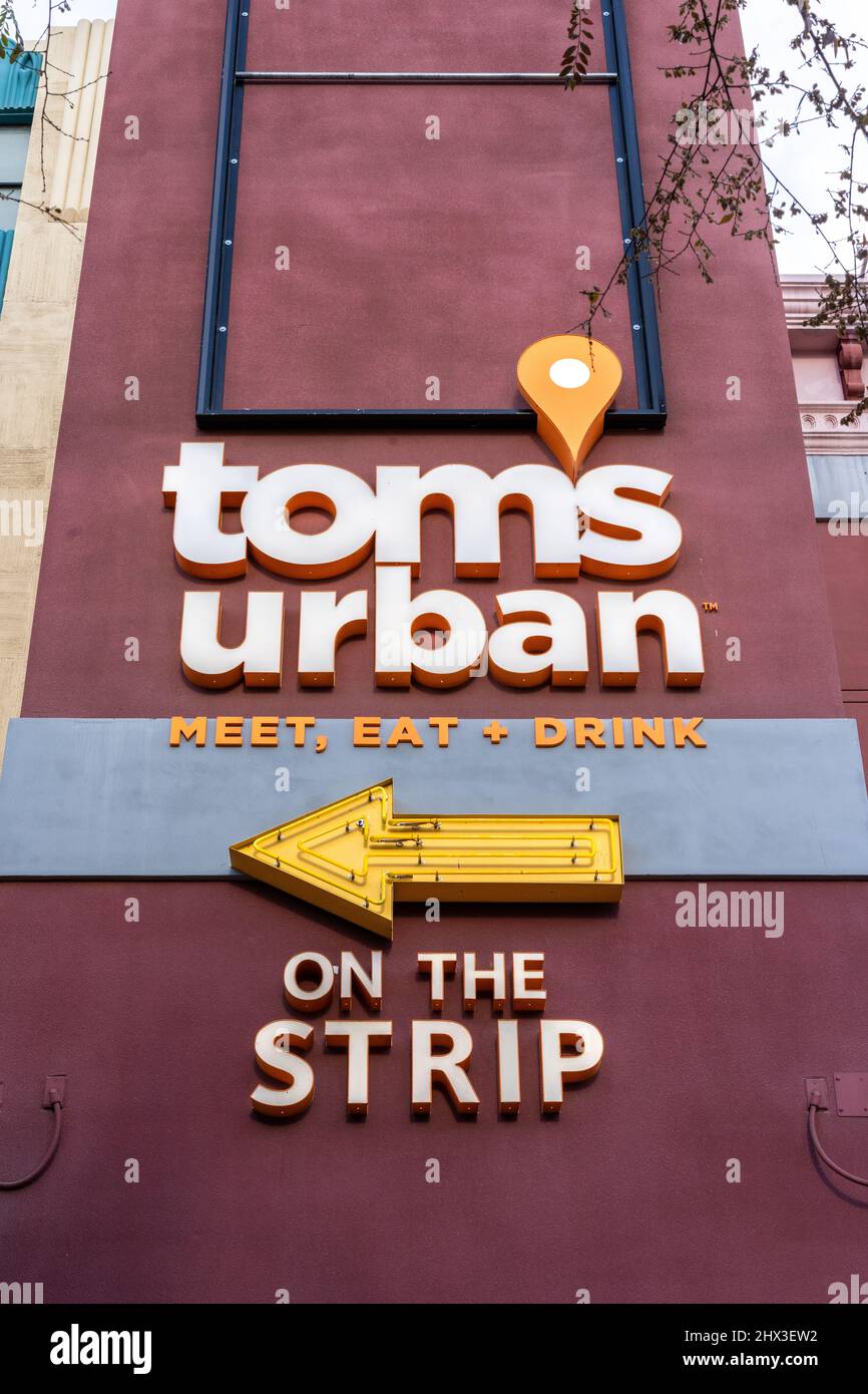 Las Vegas, NV - December 15, 2021: Tom's Urban is an American cuisine sports bar serving an all-day menu, from breakfast to late night snacks. Stock Photo
