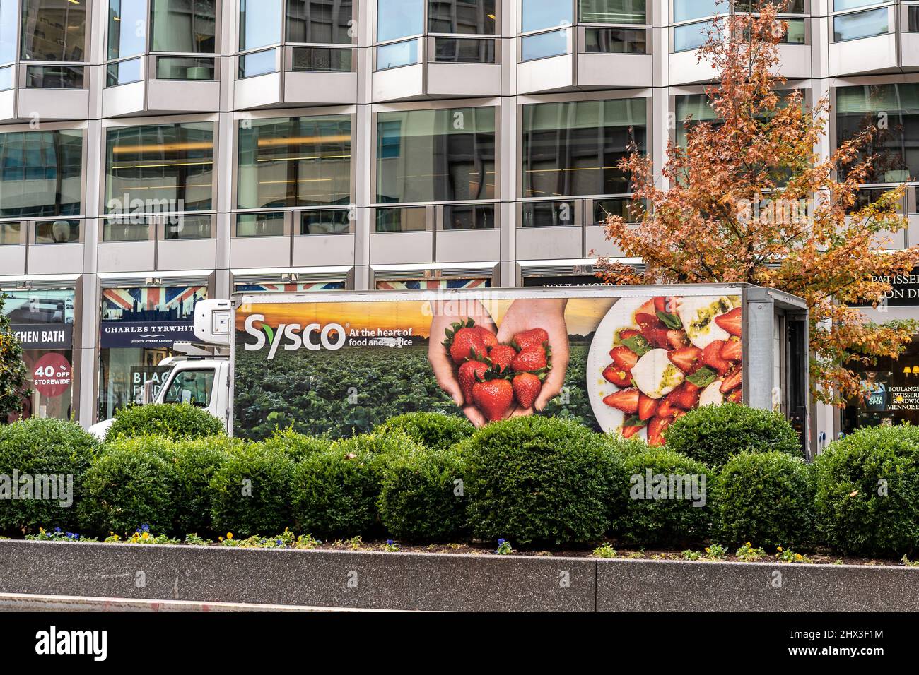 Washington D.C. - Nov. 22, 2021: Sysco delivery truck parked on the street servicing a customer. Stock Photo